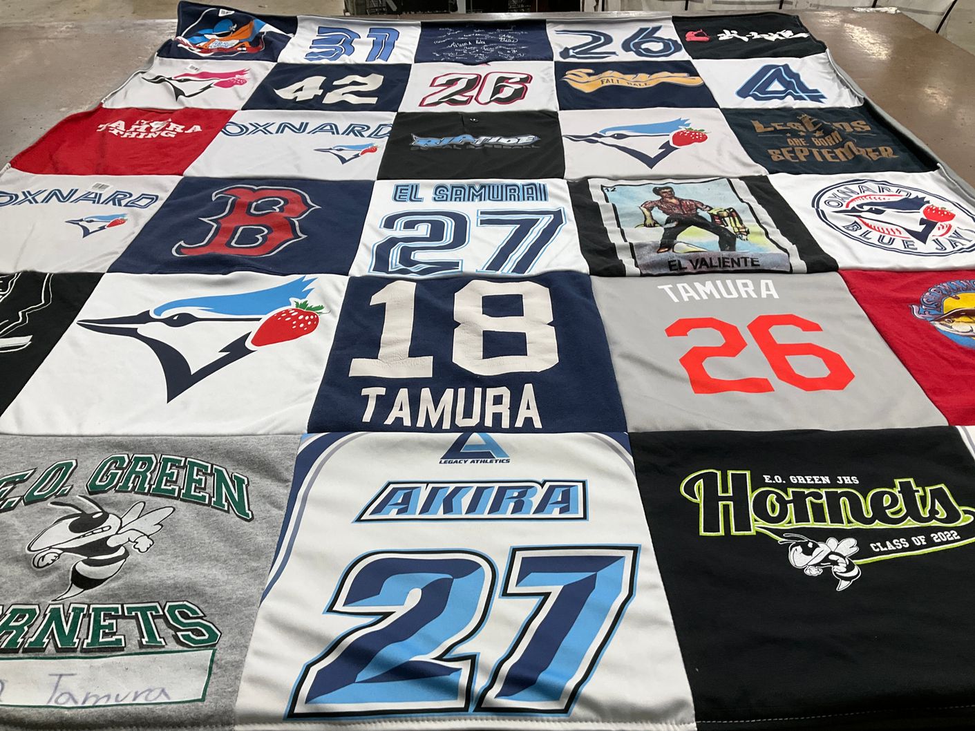 T-shirt quilt featuring toronto blue jays, e.o green junior high school hornets by Ko from CA