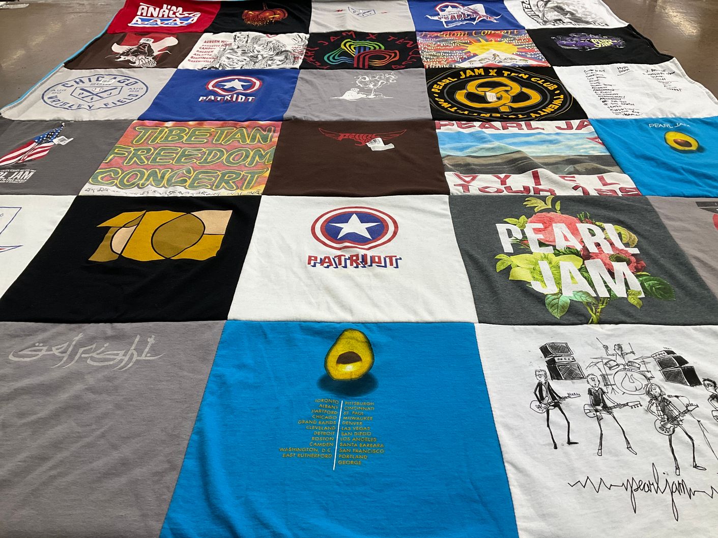 T-shirt quilt with music, activism themes by Sheryl from MD