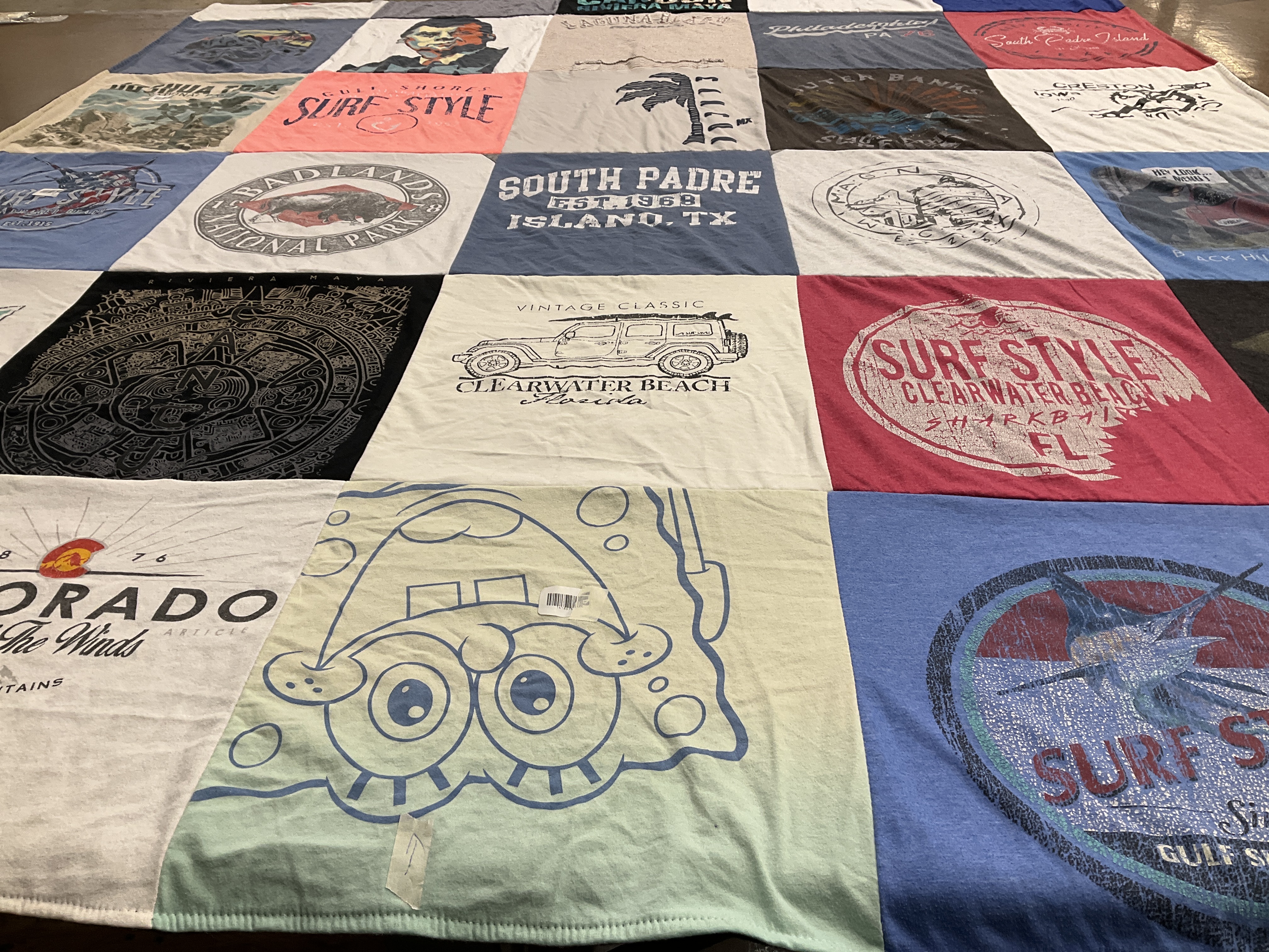 T-shirt quilt with beaches, national parks themes by Kellie from IA