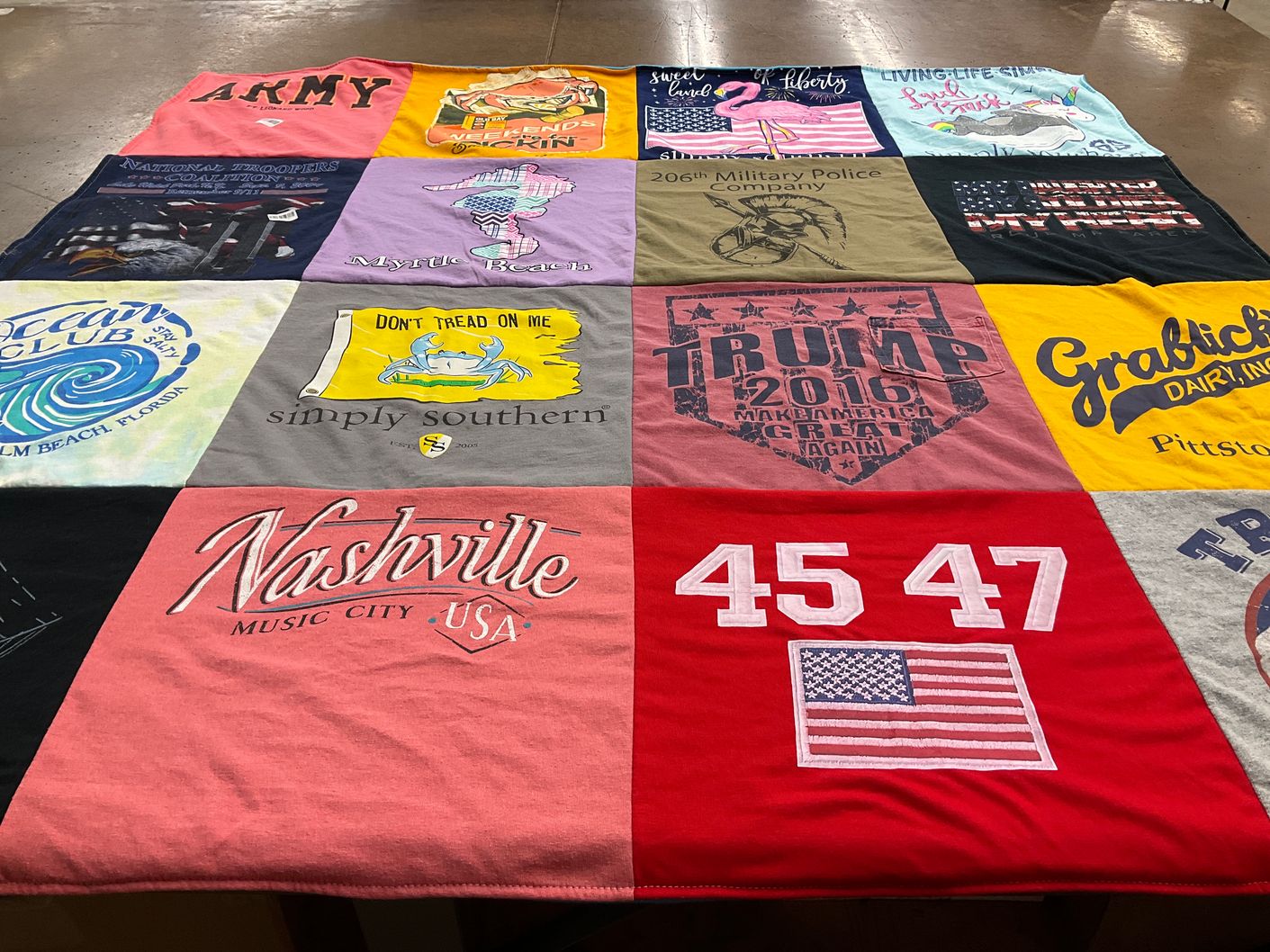 T-shirt quilt with travel, politics themes by Christine from NY
