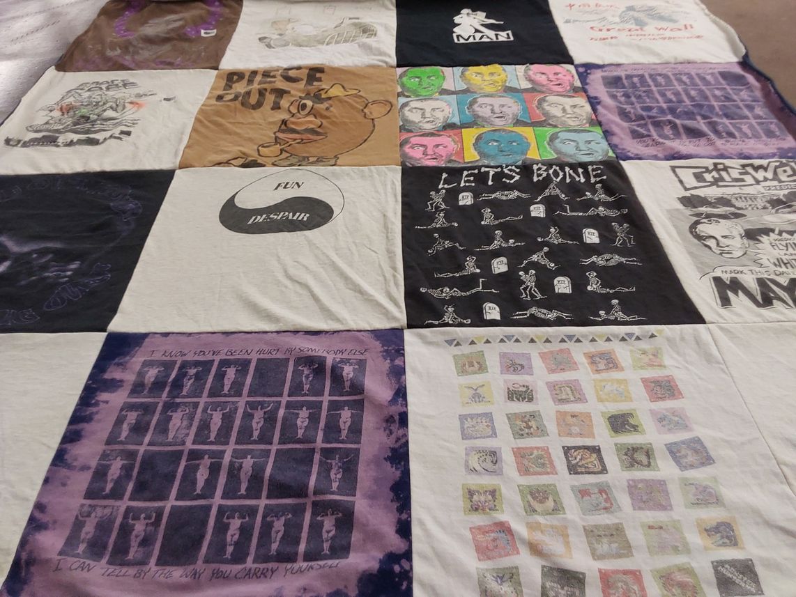 T-shirt quilt with art, humor themes by Douglass from TX