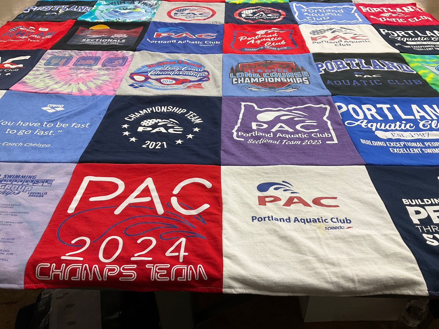 T-shirt quilt with swimming, sports themes by Jennifer  from OR