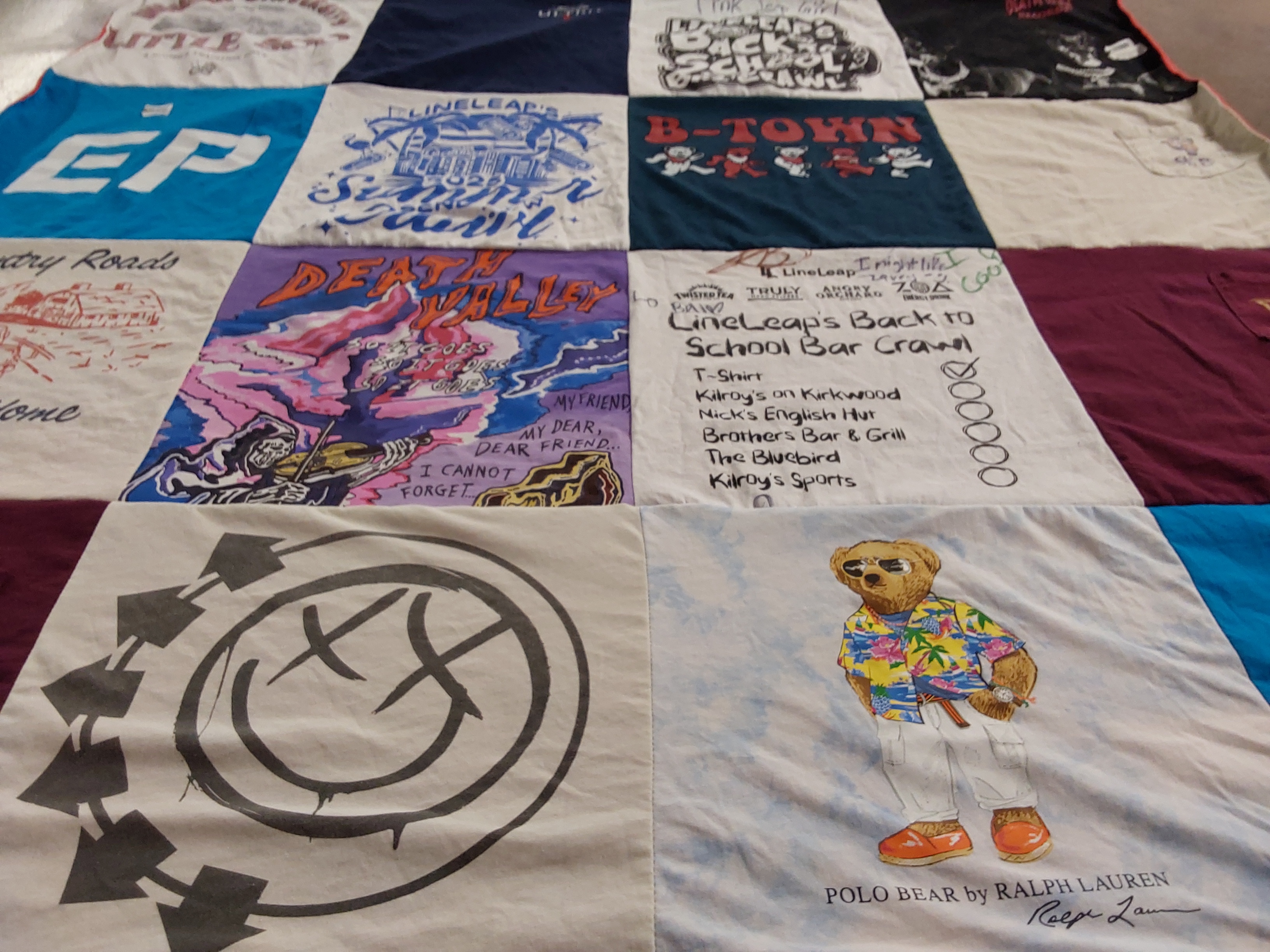T-shirt quilt with bars, music themes by Sara from CA