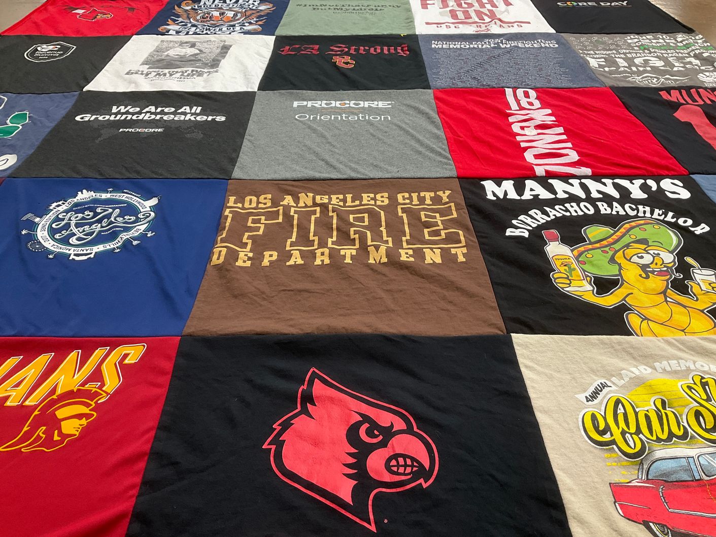 T-shirt quilt featuring university of louisville cardinals, southern california trojans by Jessica from CA