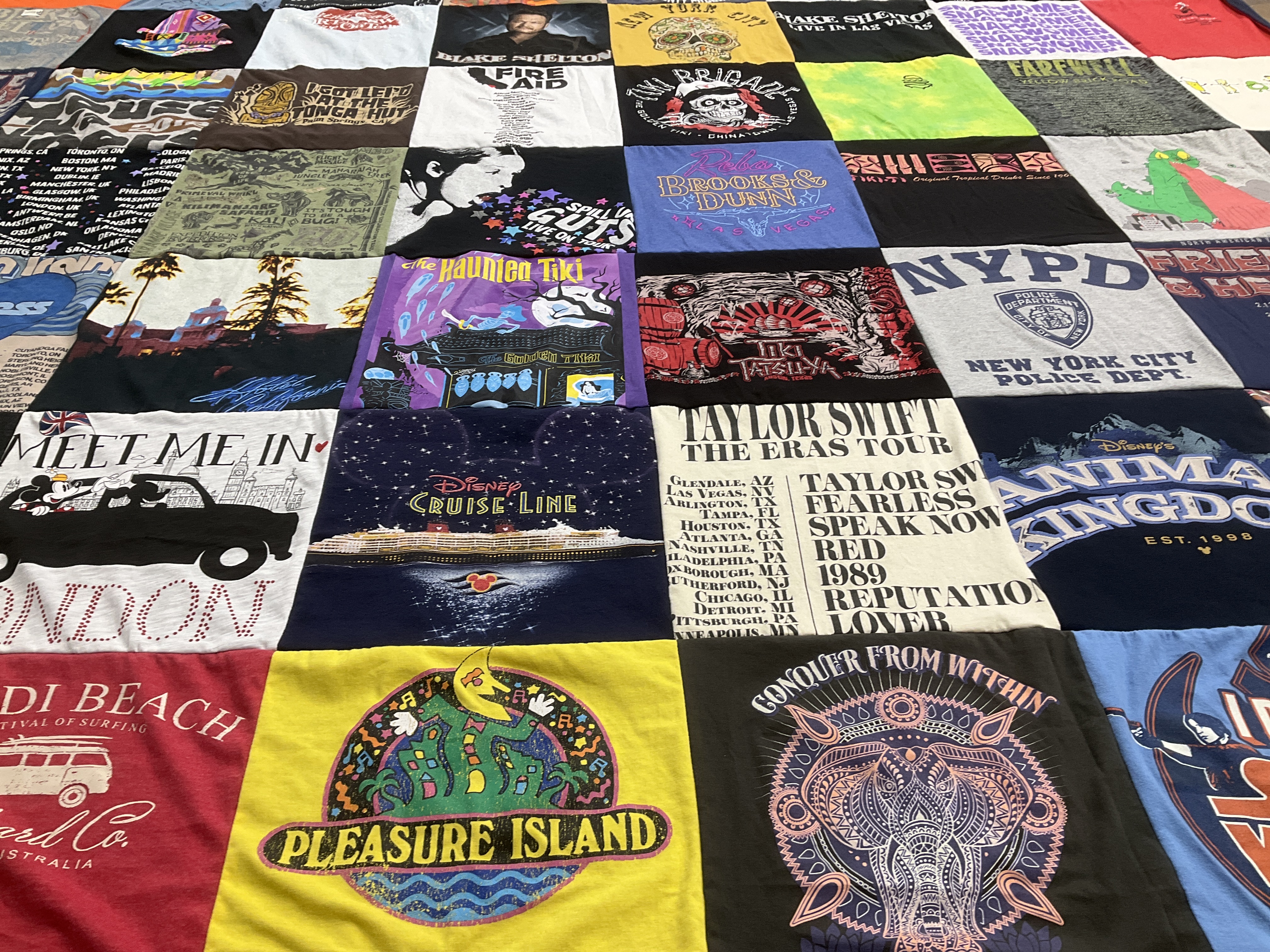 T-shirt quilt with music, travel themes by Cynthia from CA