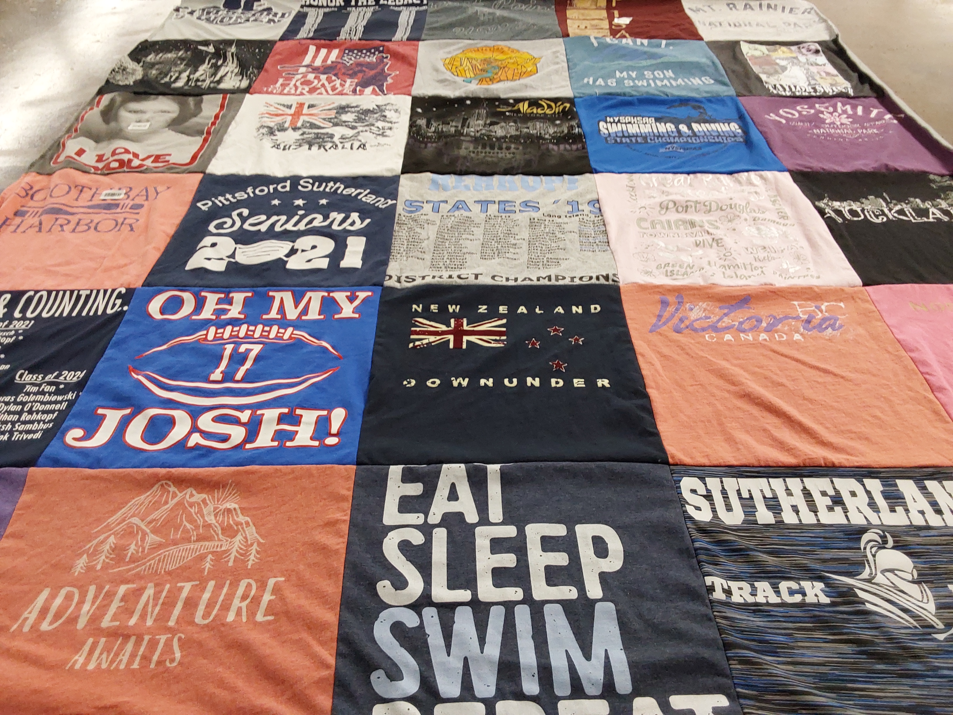 Custom Project Repat t-shirt quilt featuring shirts from pittsford sutherland high school.