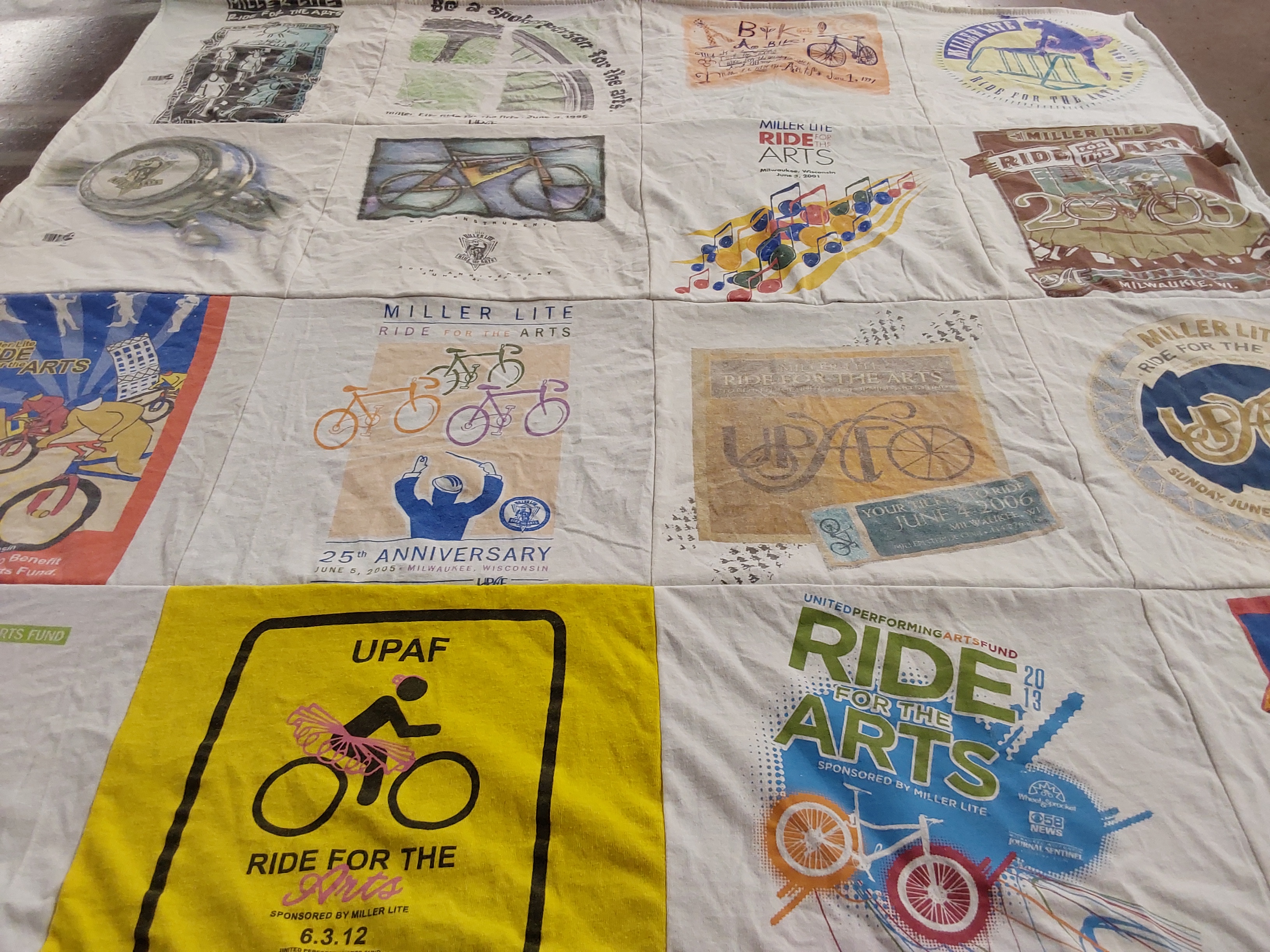 T-shirt quilt with biking, art themes by Mark from WI