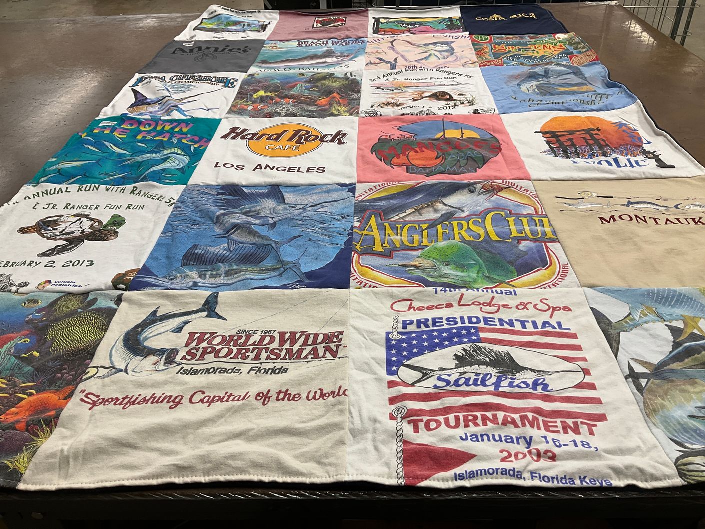 T-shirt quilt with fishing, sports themes by Thomas from FL