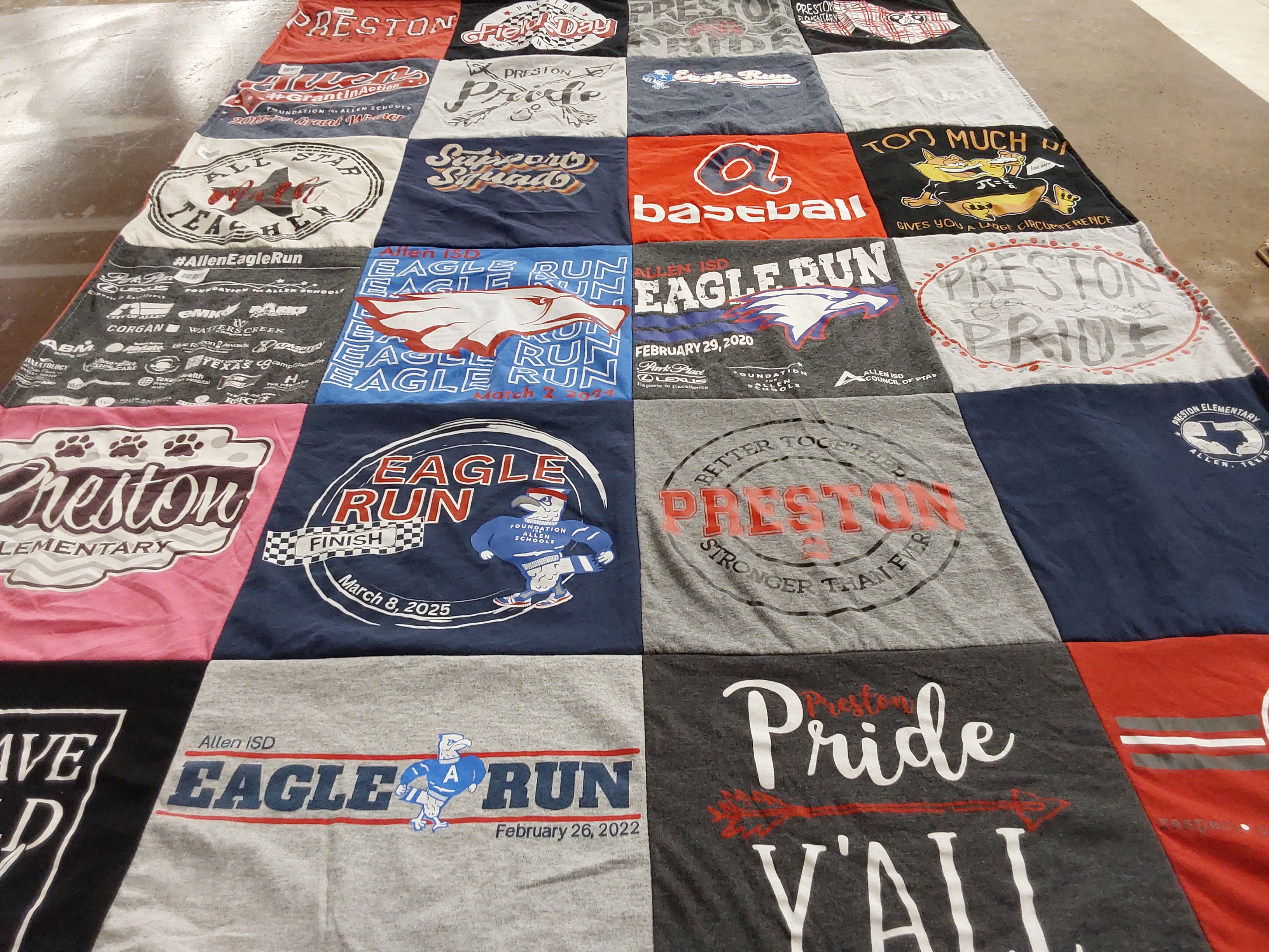 T-shirt quilt featuring allen isd eagle run team by Valarie from TX