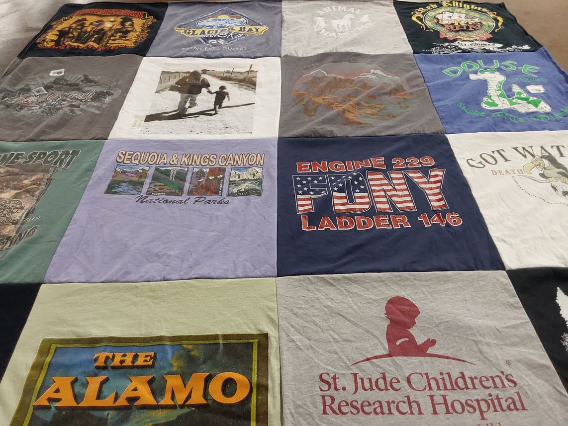 T-shirt quilt with national parks, firefighting themes by Joseph from NY