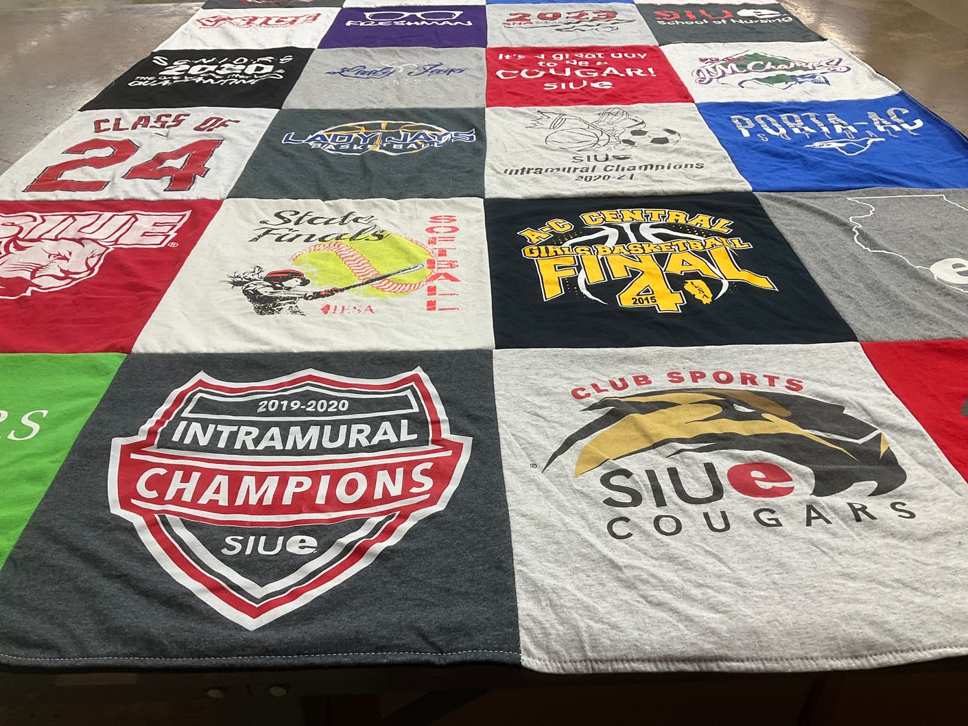 T-shirt quilt featuring southern illinois university edwardsville cougars by Emma from IL