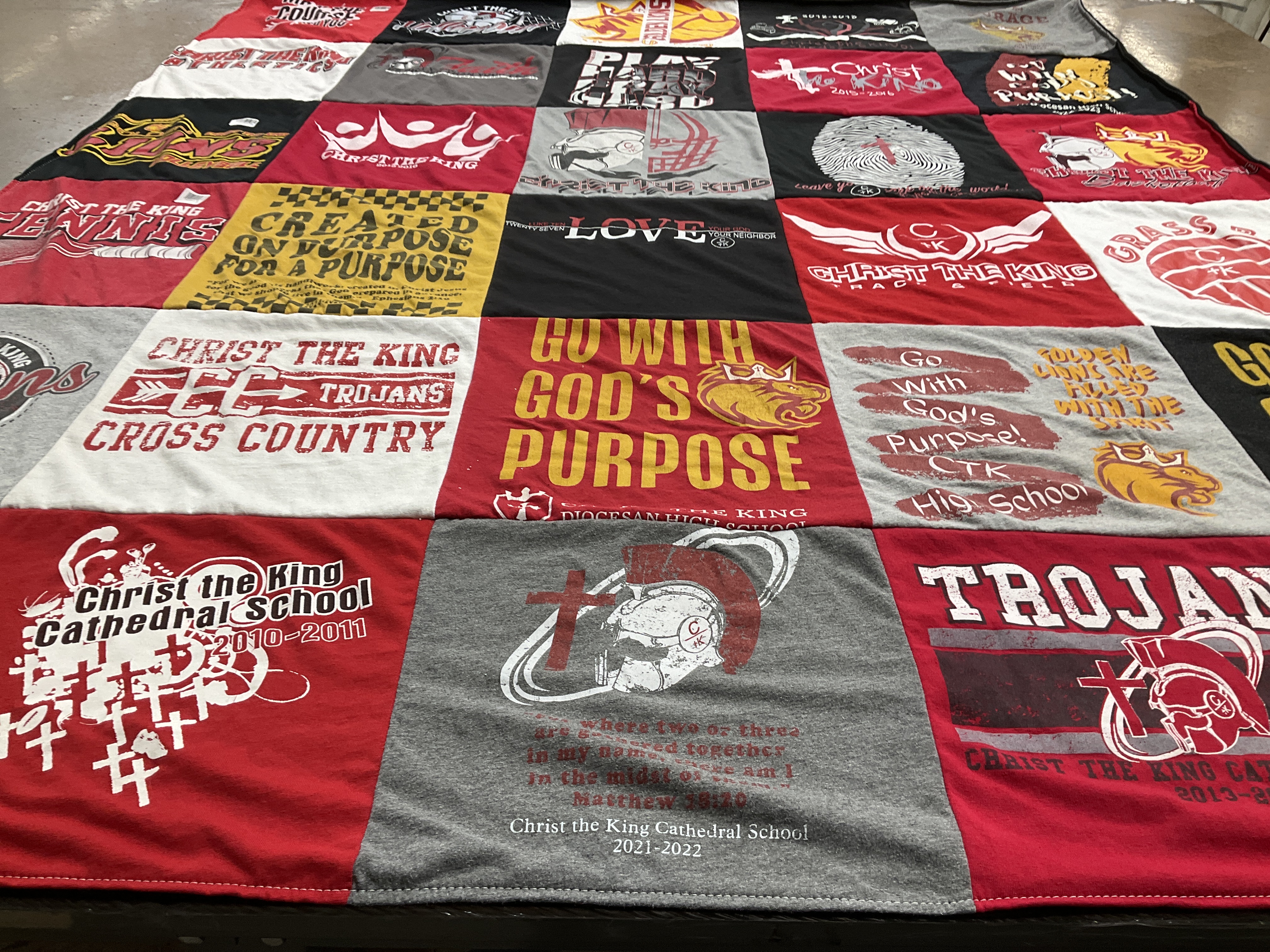 T-shirt quilt featuring christ the king trojans by Lael from TX