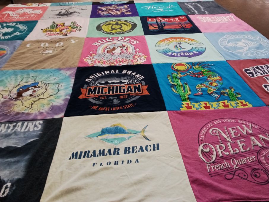 T-shirt quilt with travel, beaches themes by Kathy from NE