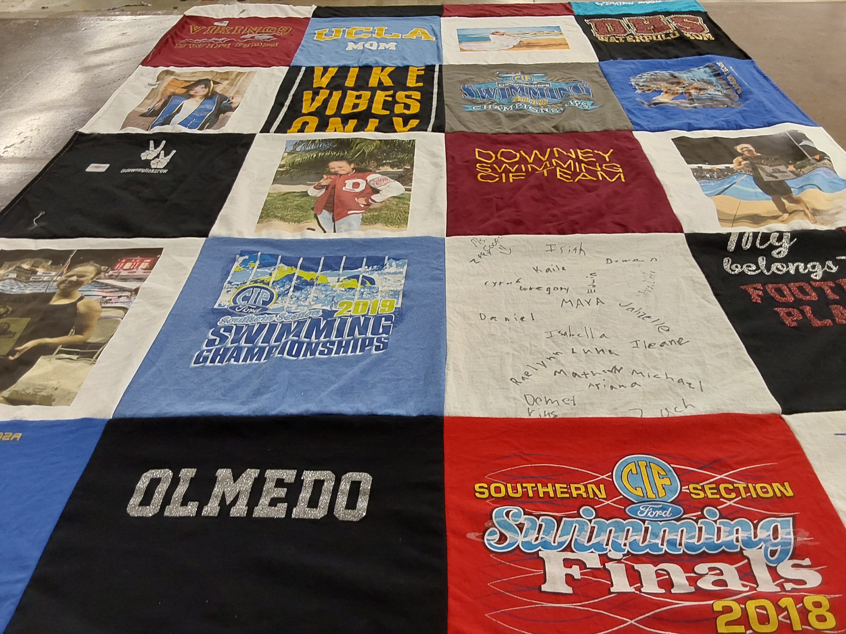 T-shirt quilt featuring downey swimming by Margaret from CA