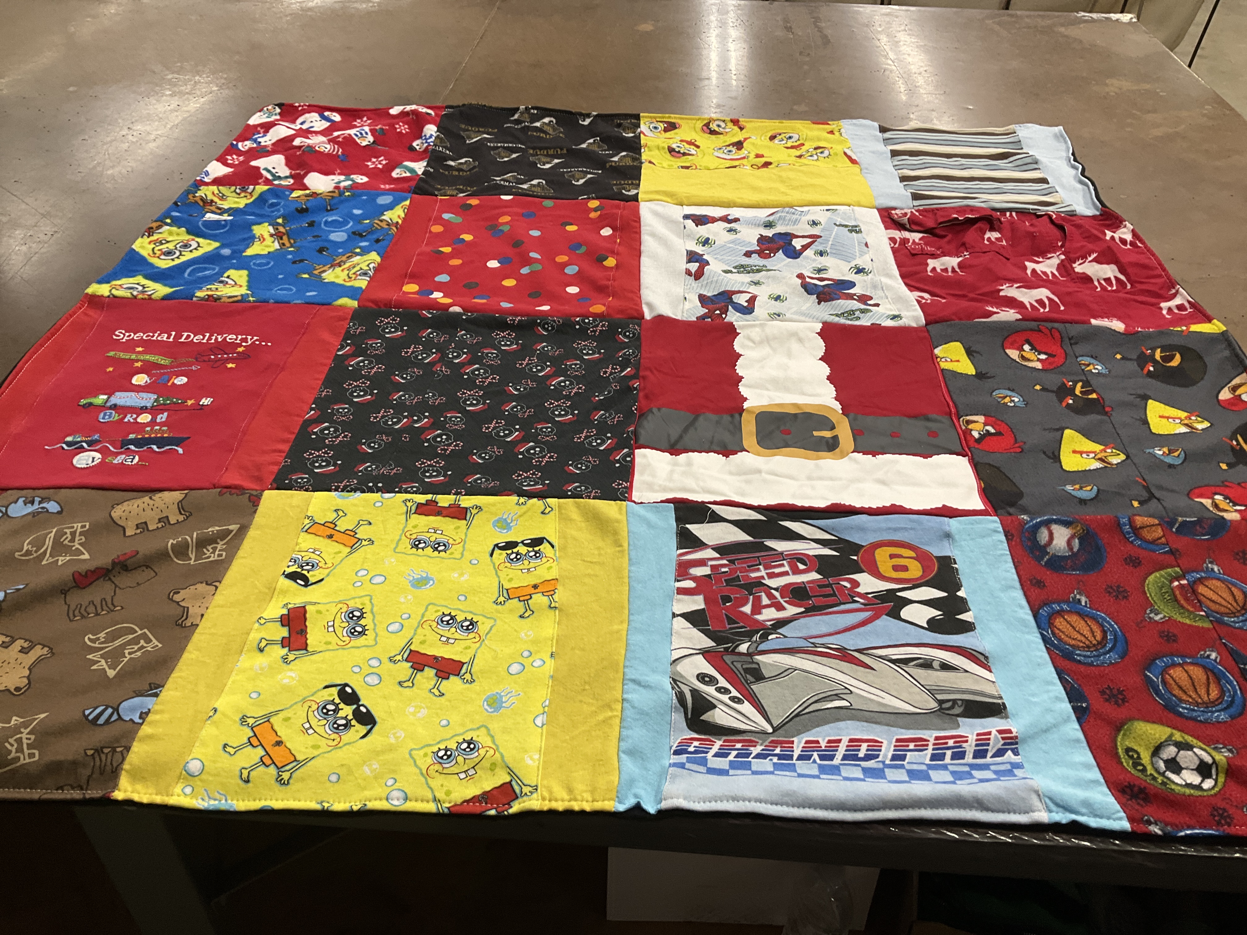 T-shirt quilt with cartoons, movies themes by Mendy from IN