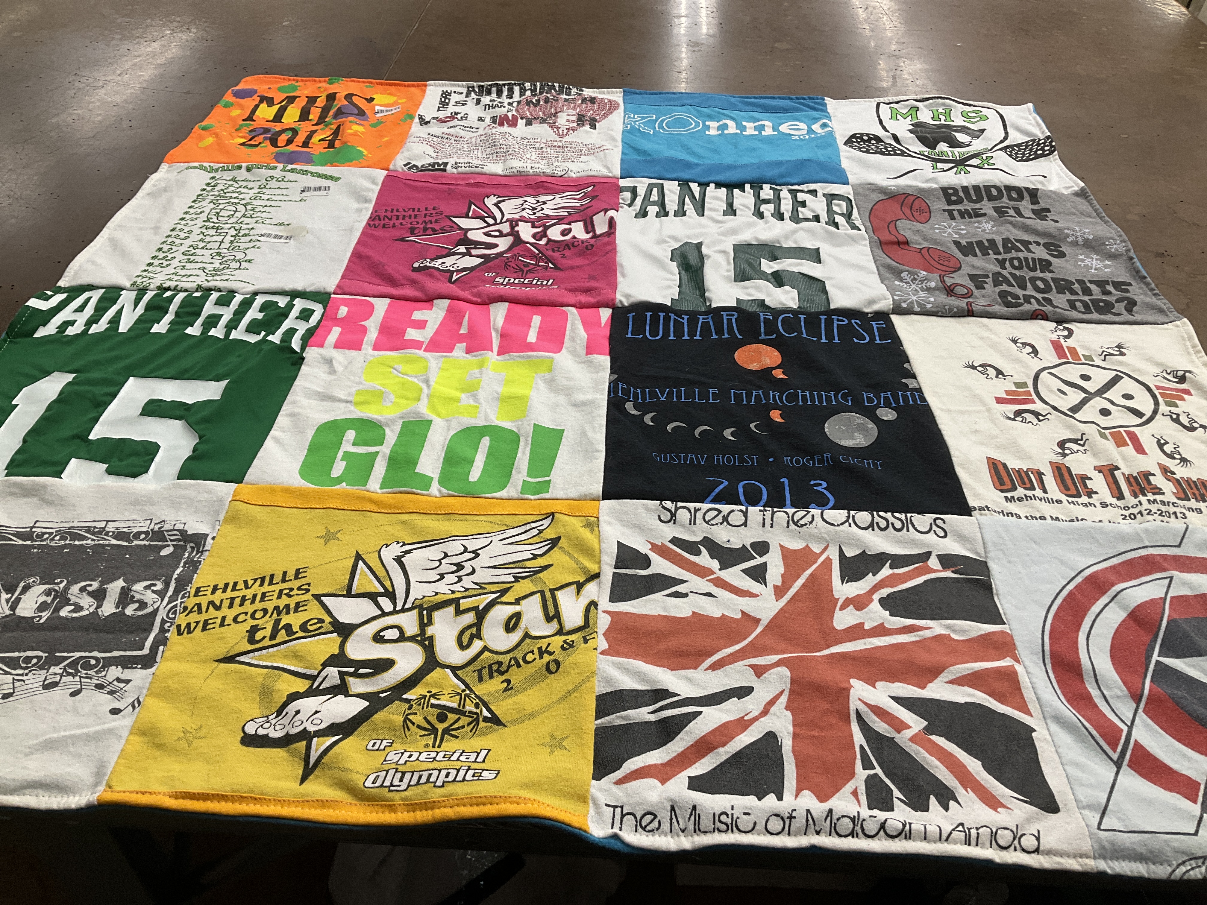 T-shirt quilt featuring panther track by Christina from VA