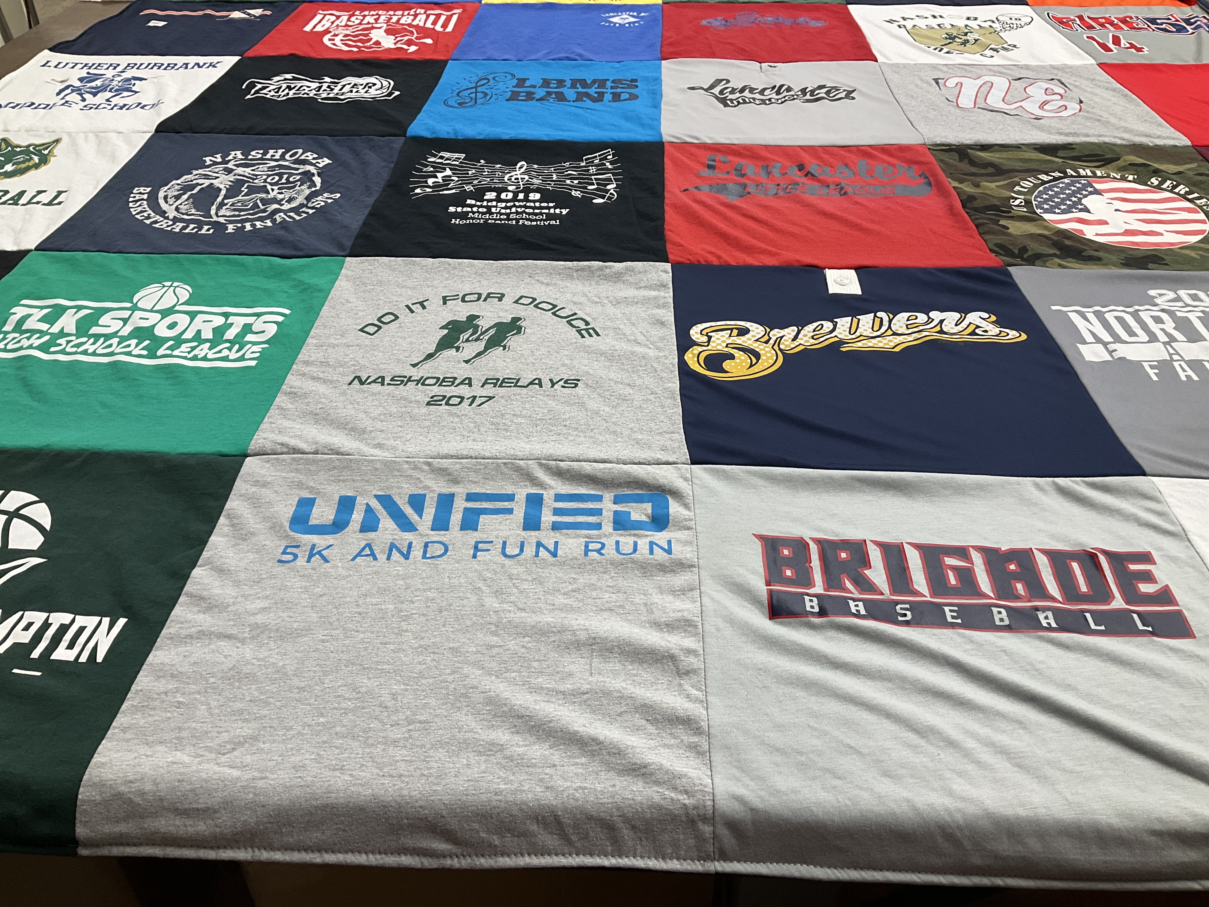 T-shirt quilt featuring nashoba basketball, brigade baseball by Lisa from MA