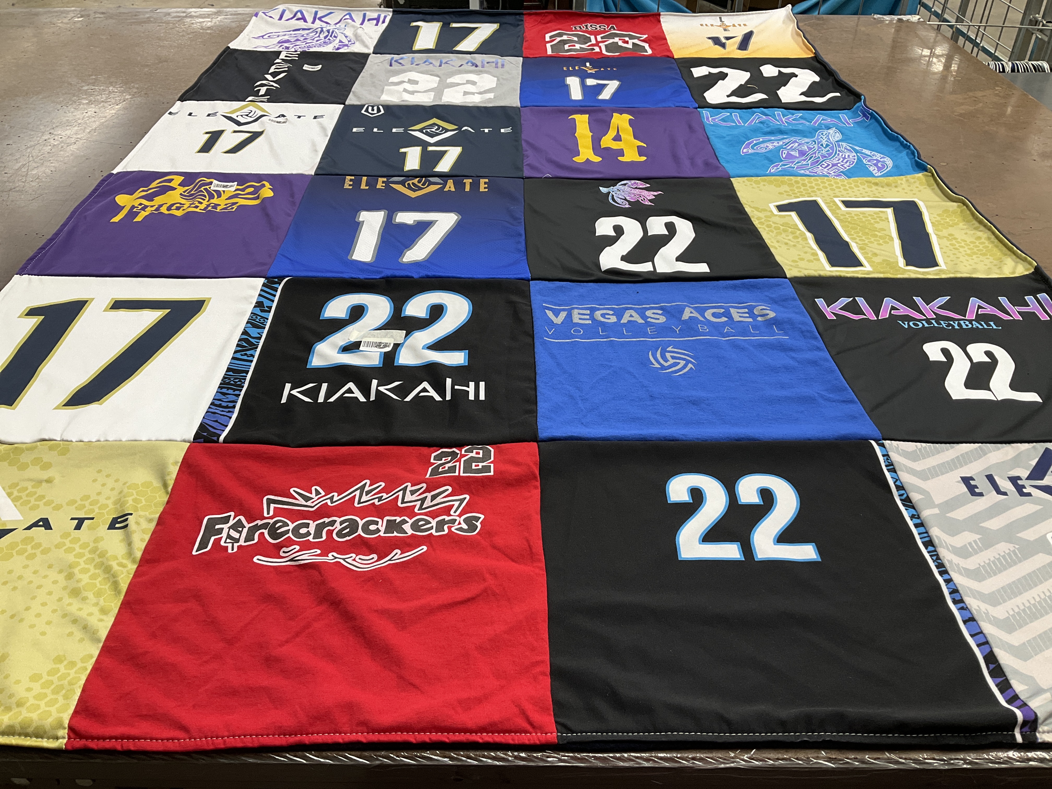 T-shirt quilt with sports, volleyball themes by Alison from NV