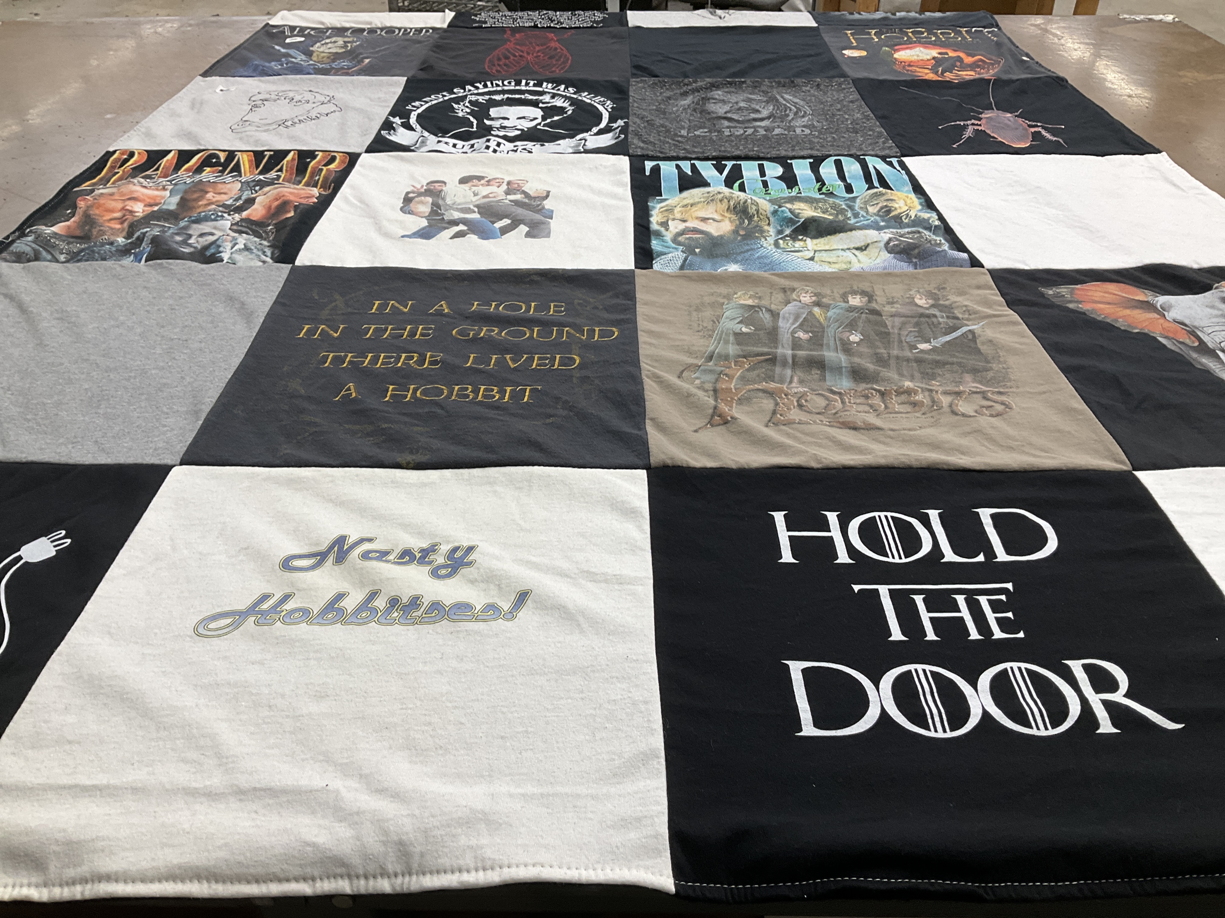 T-shirt quilt with fantasy, literature themes by Cindy from TX