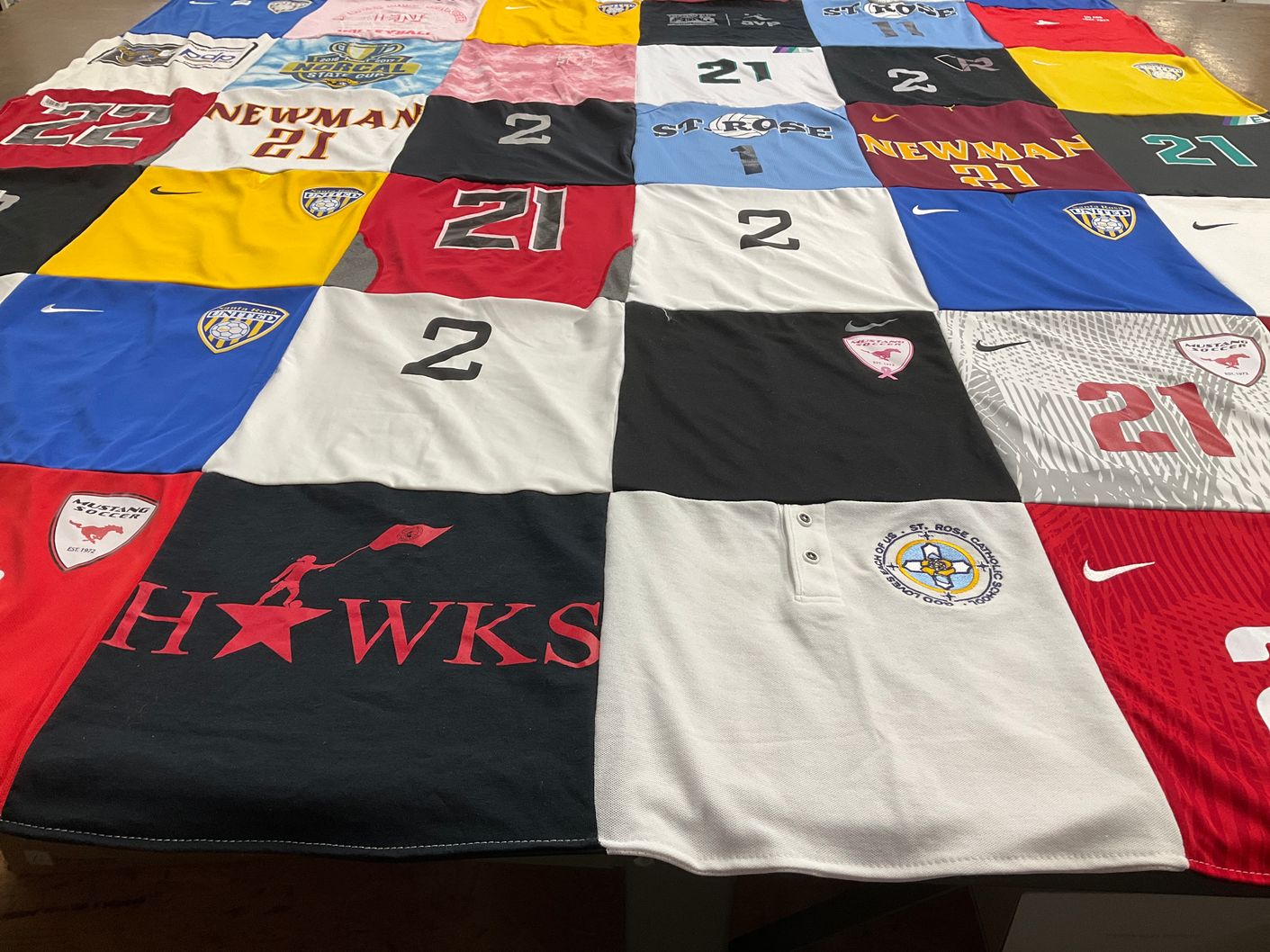 T-shirt quilt featuring newman university, st rose university by Willow from CA
