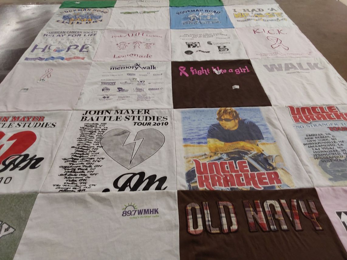 T-shirt quilt with music, cancer awareness themes by Sjodin from SC