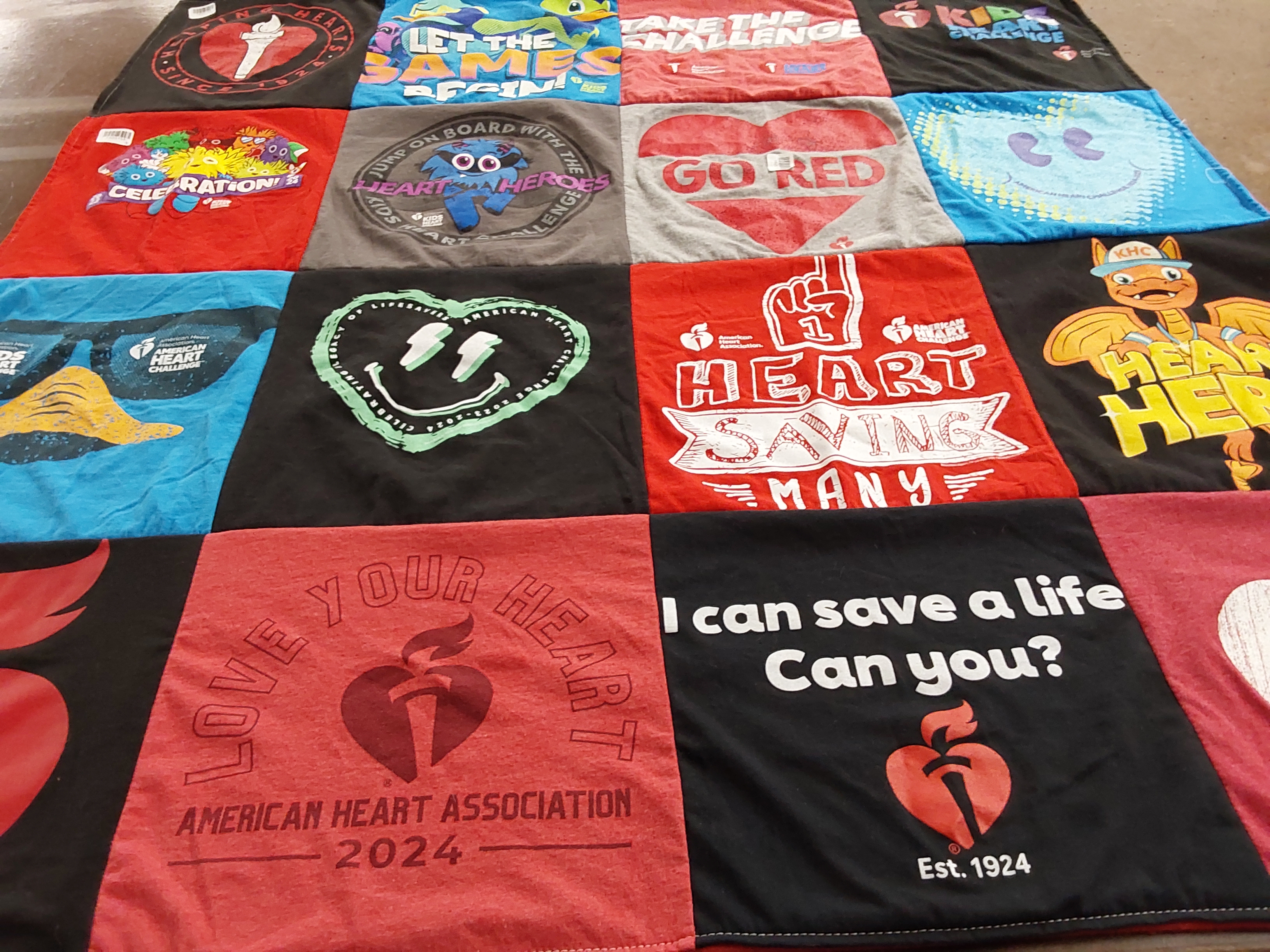 T-shirt quilt with health, fitness themes by DeAnna from TX