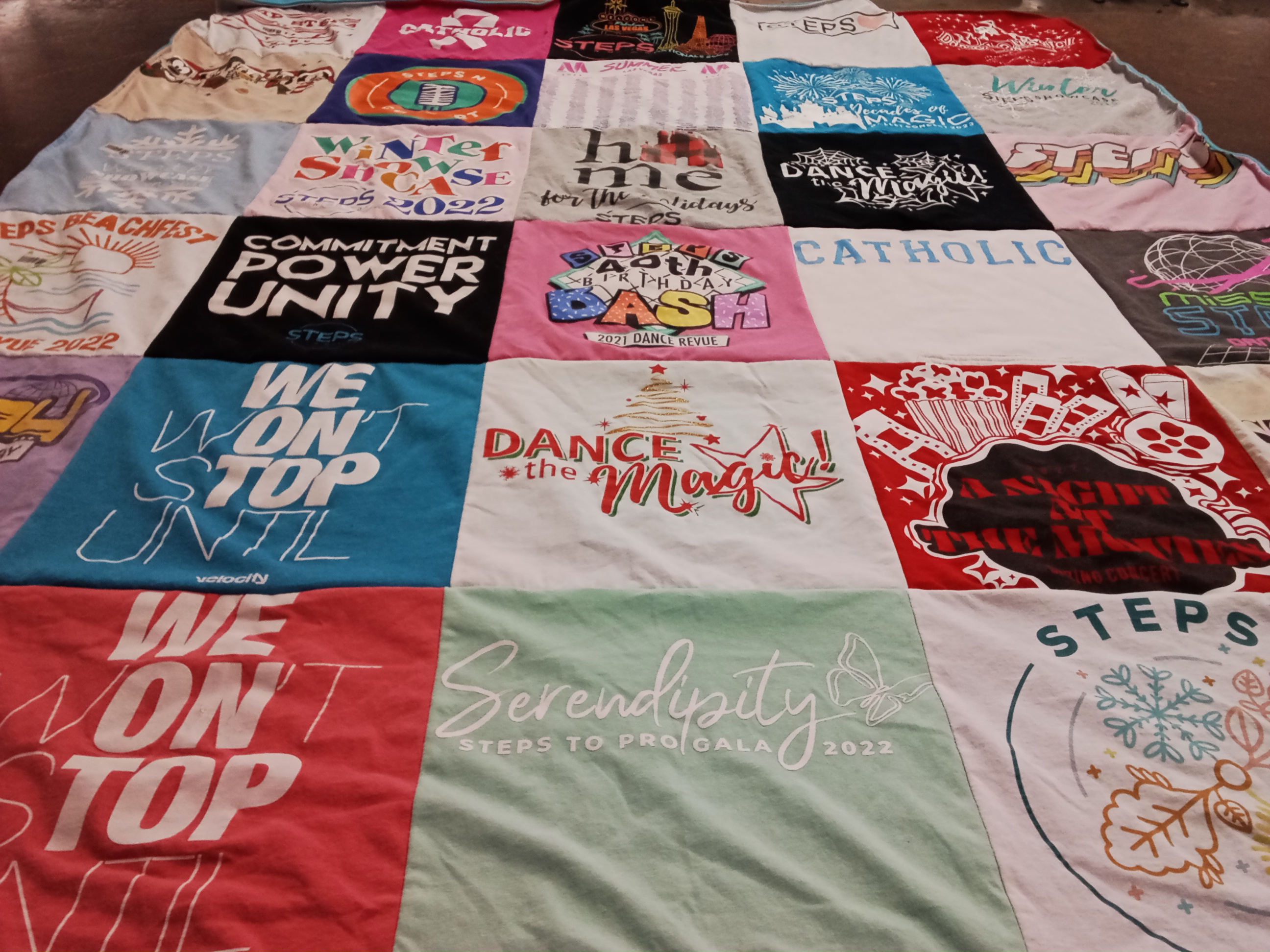 T-shirt quilt with dance, community themes by Mandy from SC