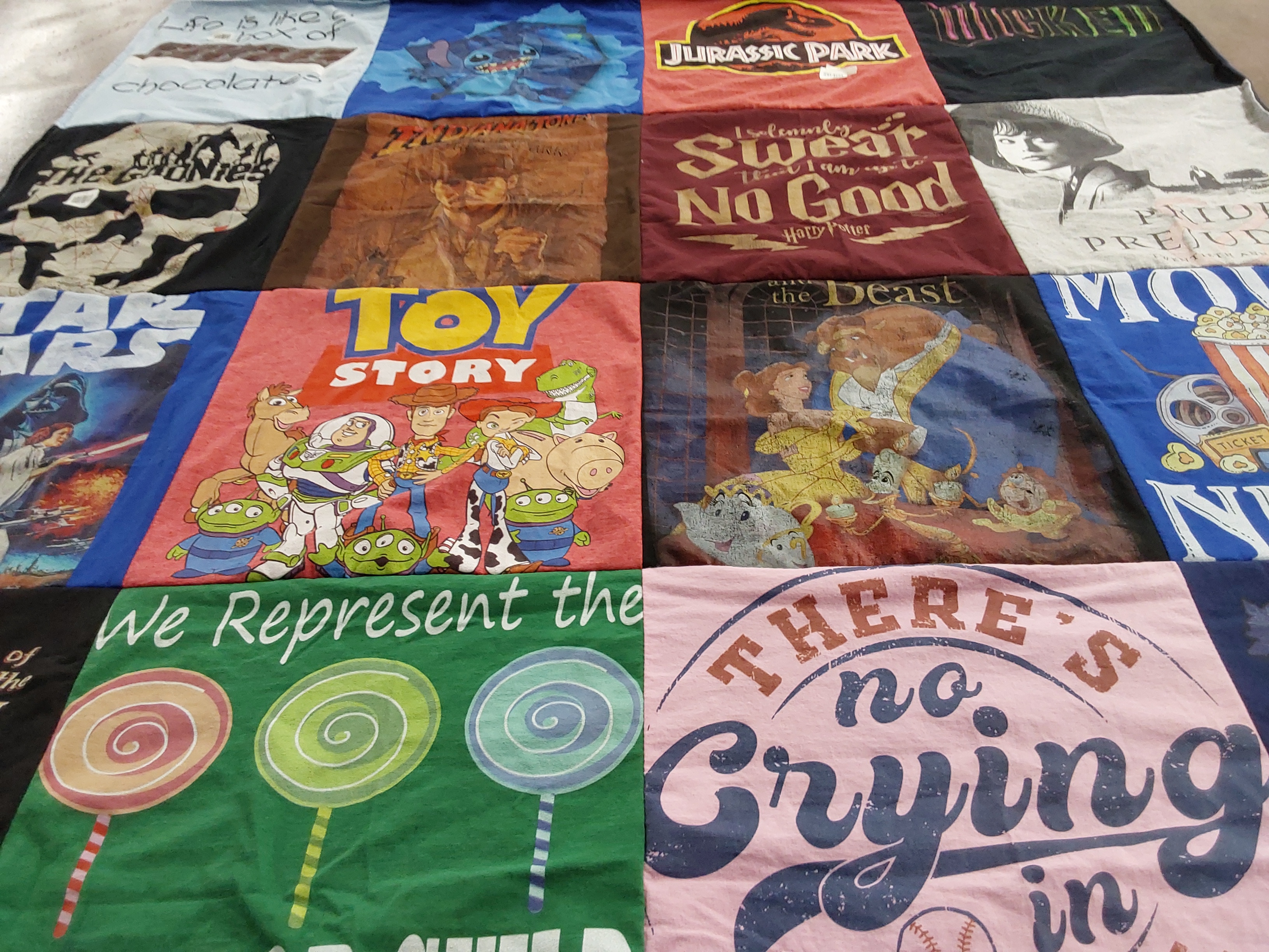 T-shirt quilt with movies, animation themes by Tara from CO