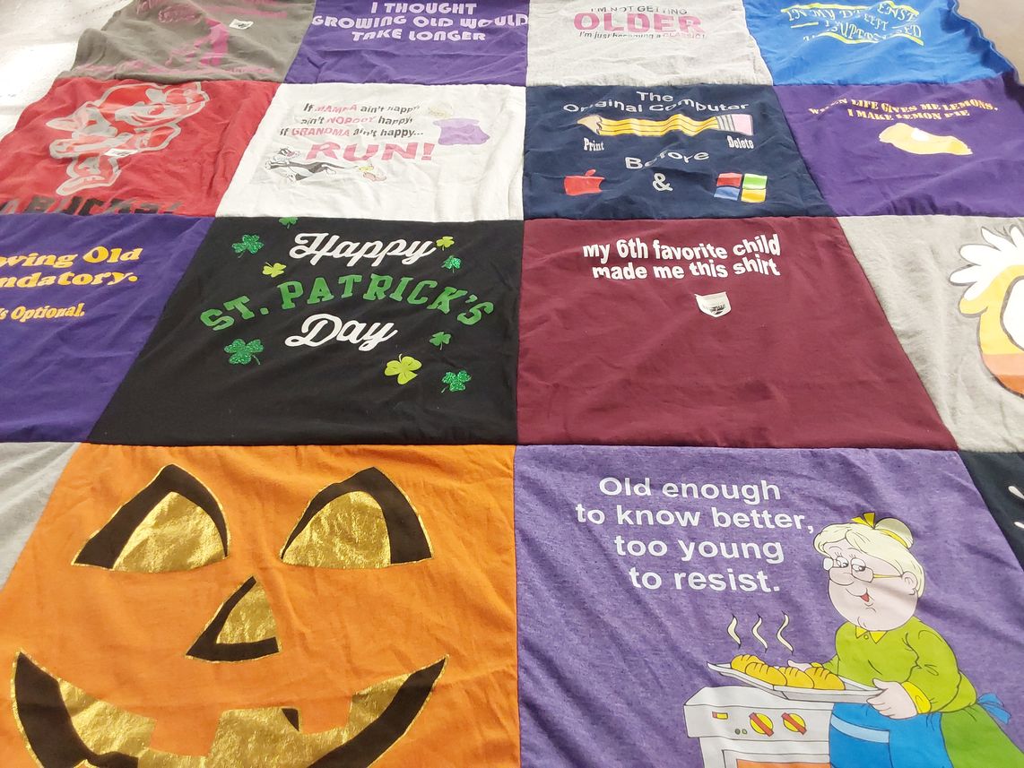 T-shirt quilt with halloween, st themes by Jane from OH