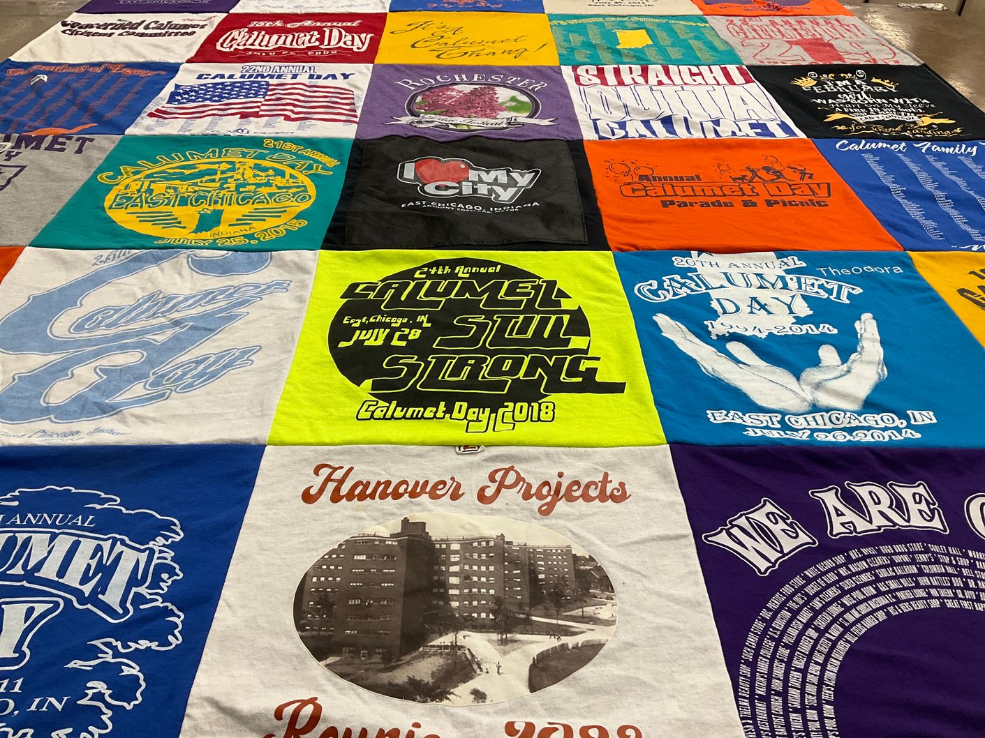 T-shirt quilt with community events, local culture themes by Theodora from IN