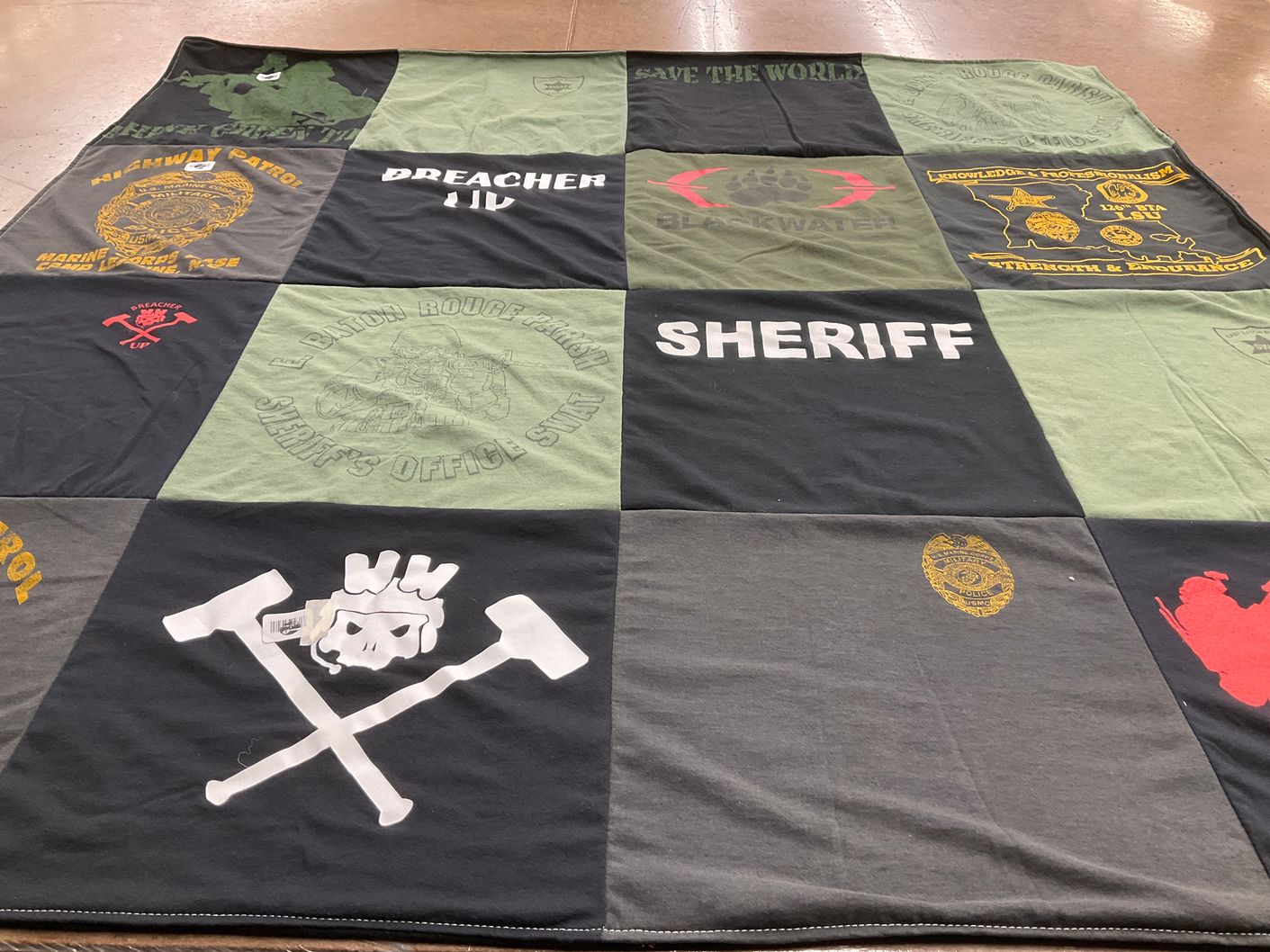 T-shirt quilt with law enforcement, safety themes by Cline from LA