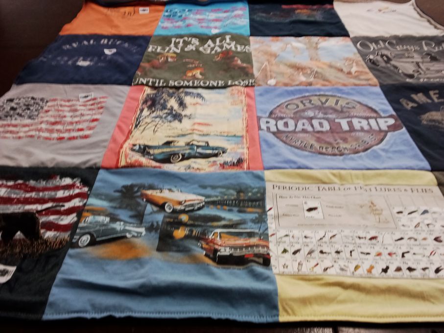 T-shirt quilt with fishing, traveling themes by Candace from GA