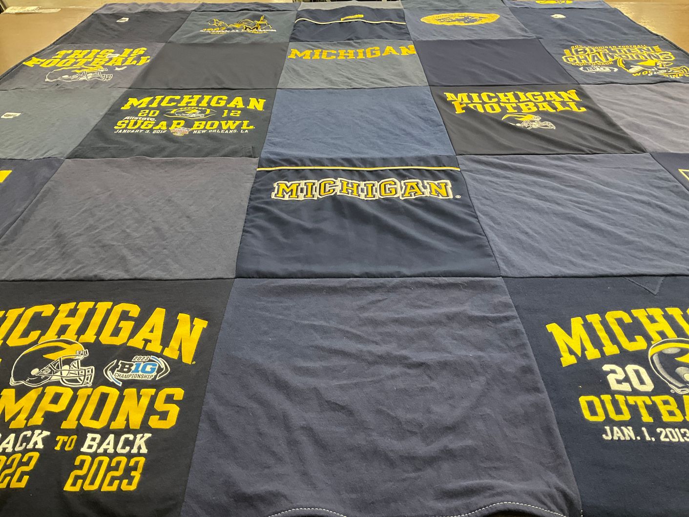 T-shirt quilt featuring university of michigan football team by Tim from MN