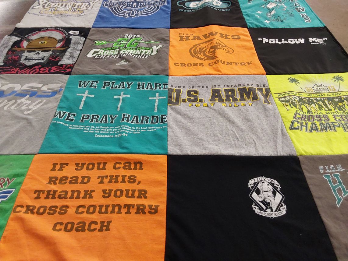 T-shirt quilt featuring f.i.s.h. hawks cross country by Jill from FL