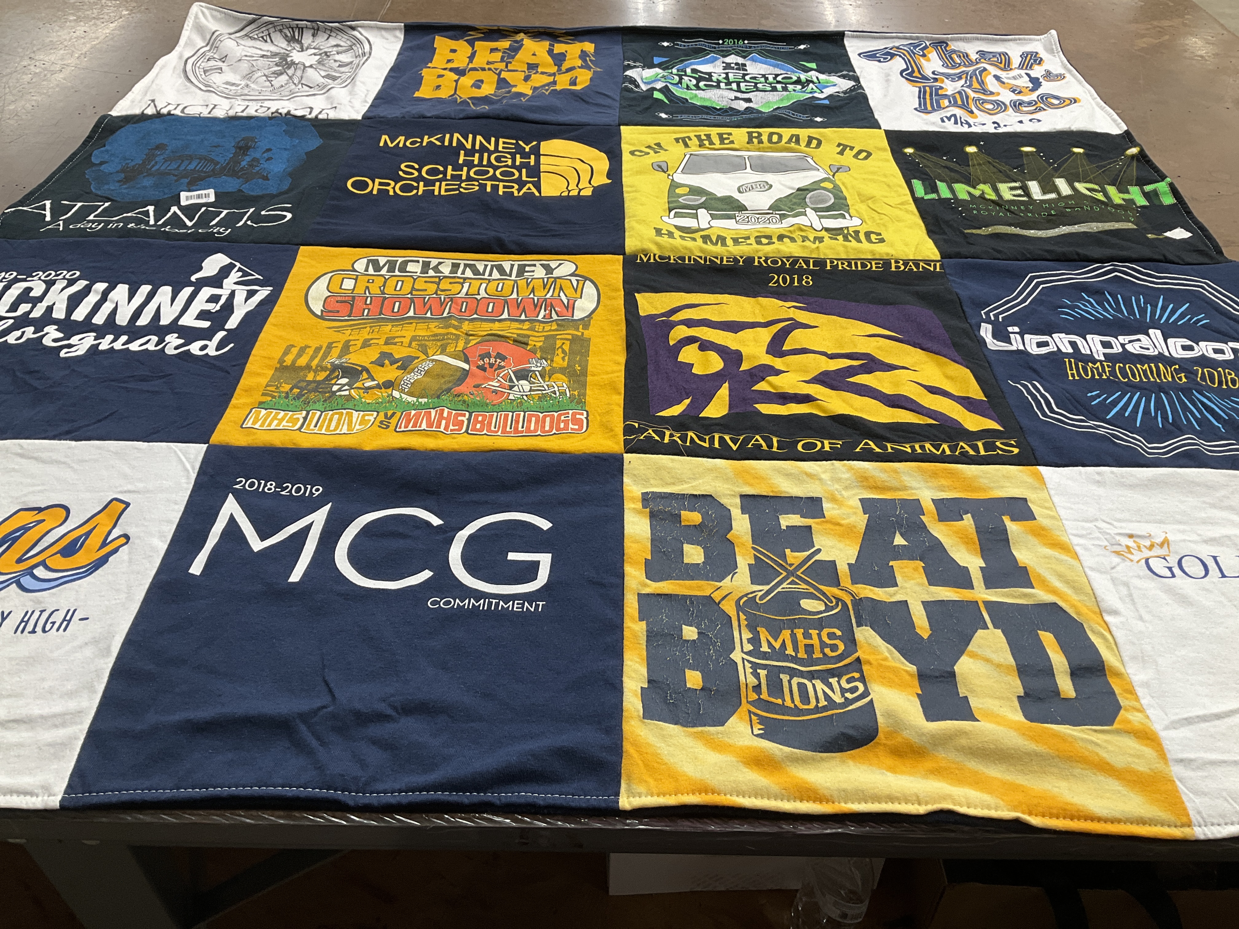 T-shirt quilt featuring mckinney high school lions, mckinney high school bulldogs by Kayla from TX