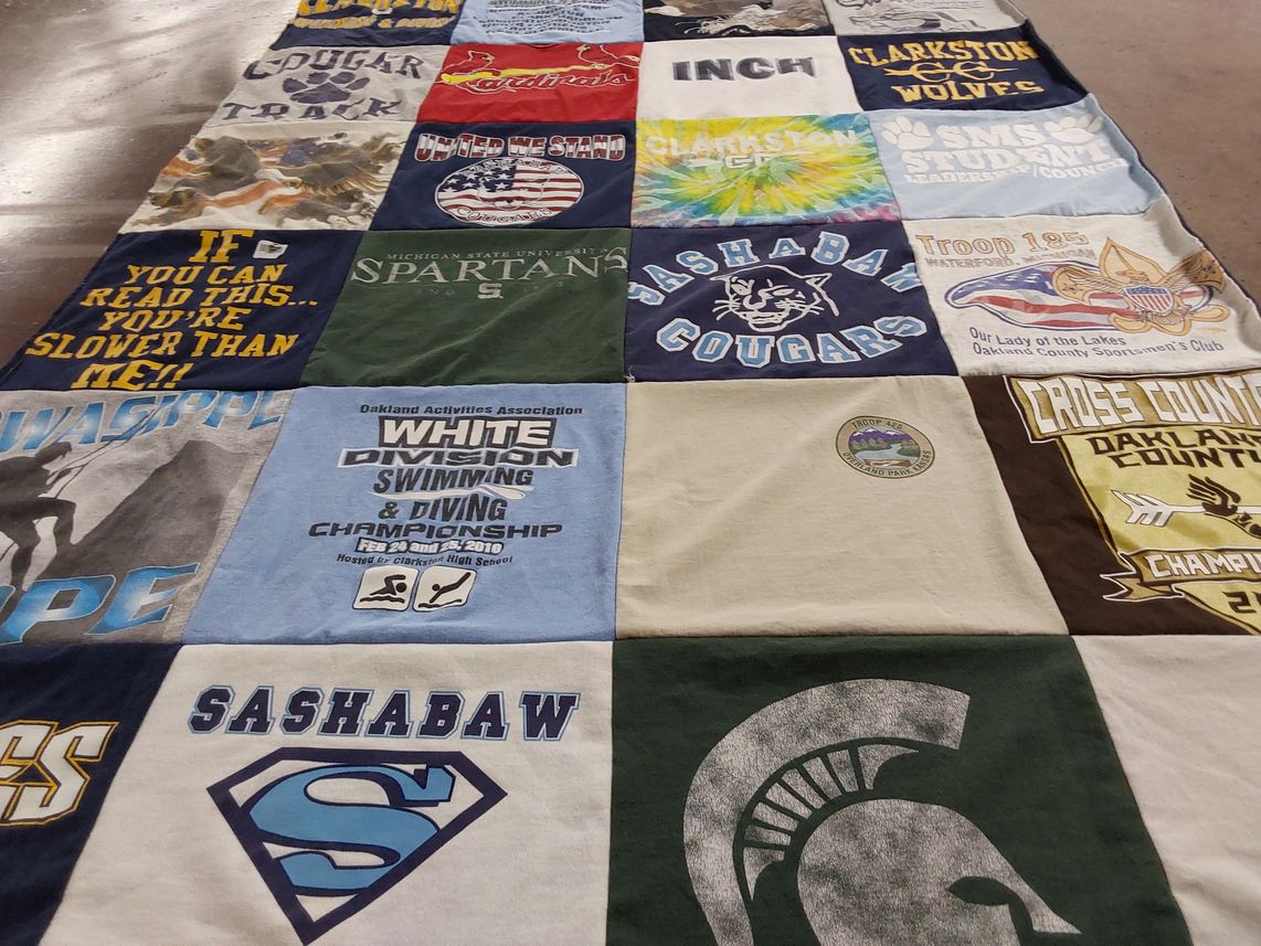 T-shirt quilt featuring clarkston wolves, sashabaw cougars by Tamara from MI