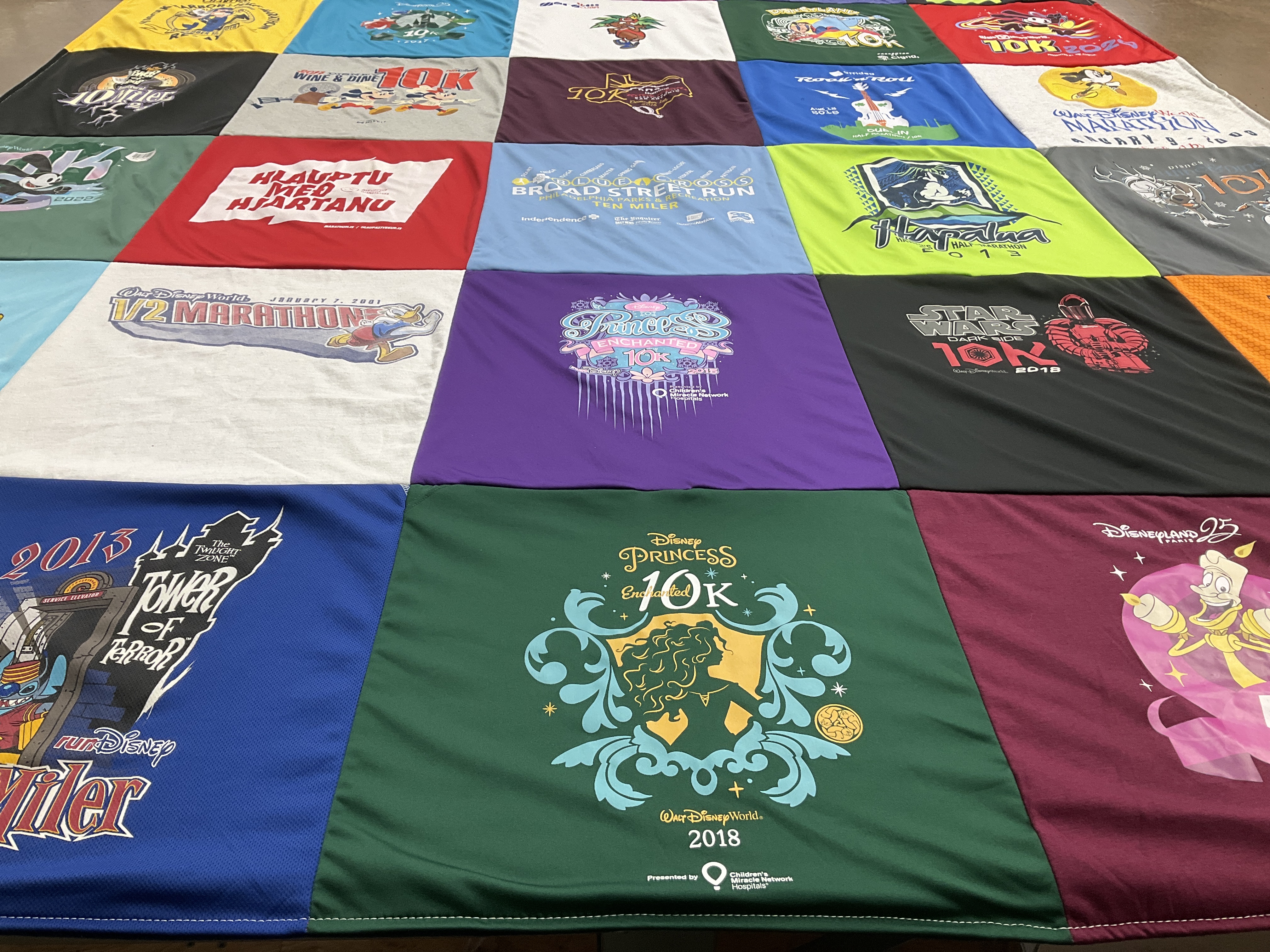 T-shirt quilt with running, disney themes by Terry from FL