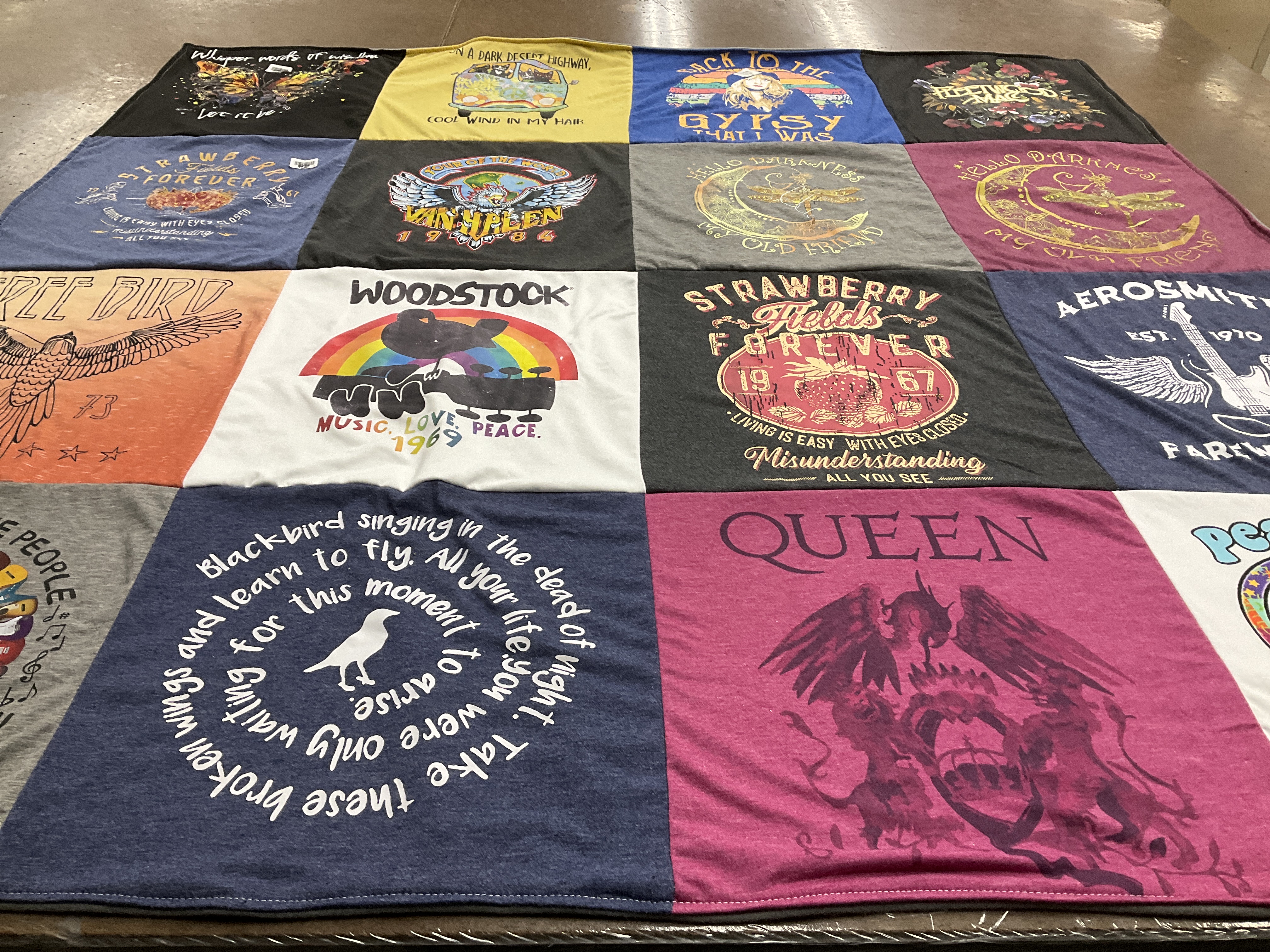 T-shirt quilt with music, travel themes by Vickie from OH