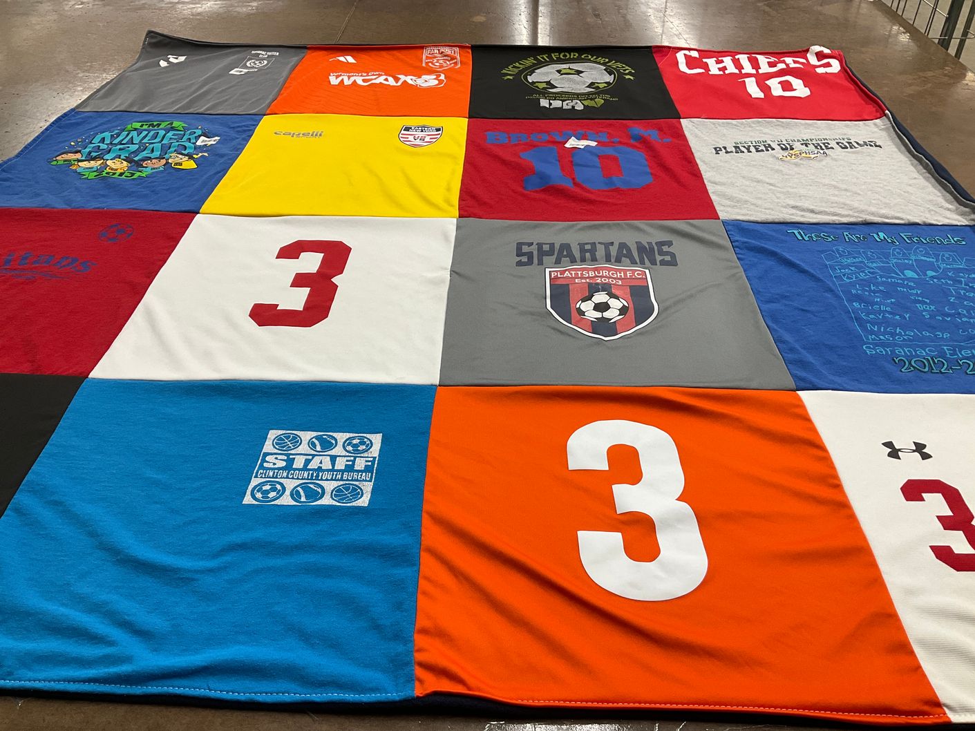 T-shirt quilt featuring plattsburgh fc by Emily from NY