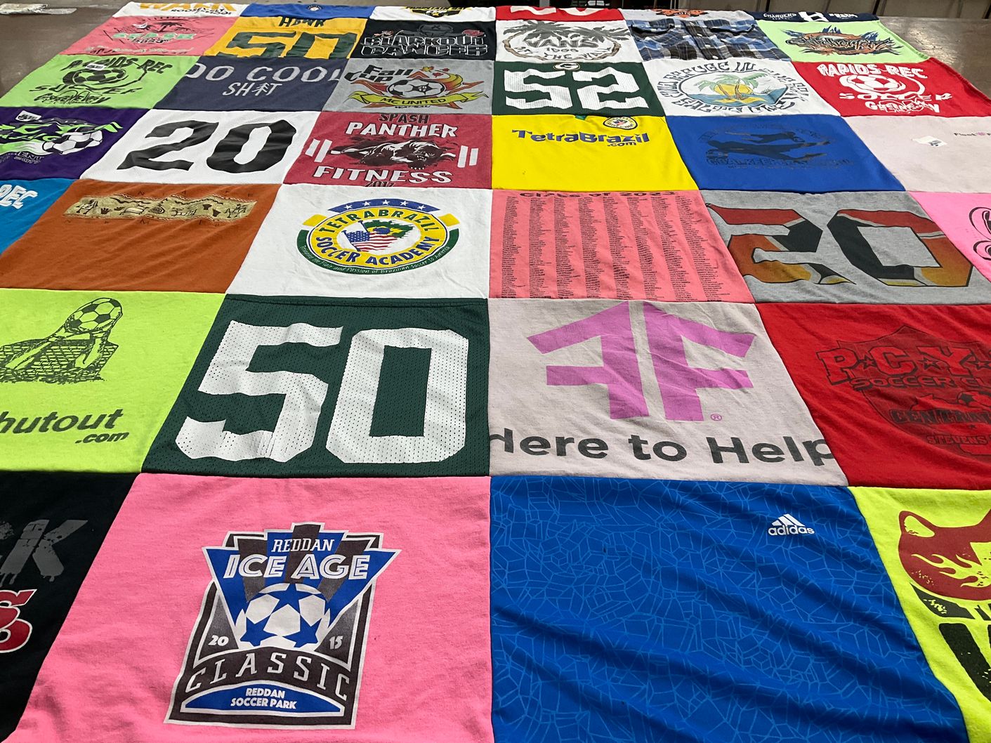 T-shirt quilt with soccer, fitness themes by Katherine from WI