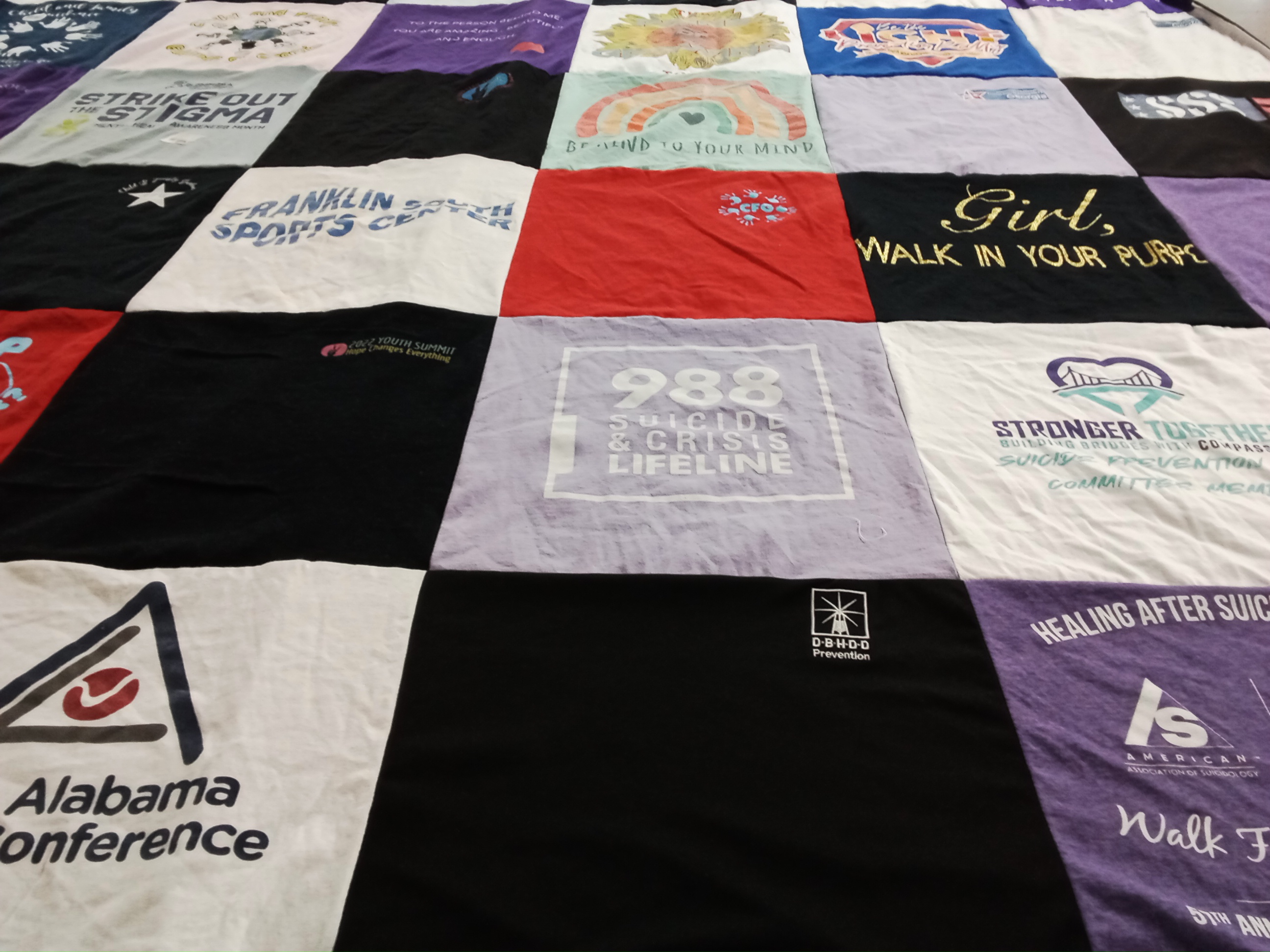 T-shirt quilt with mental health, sports themes by Rachael from GA