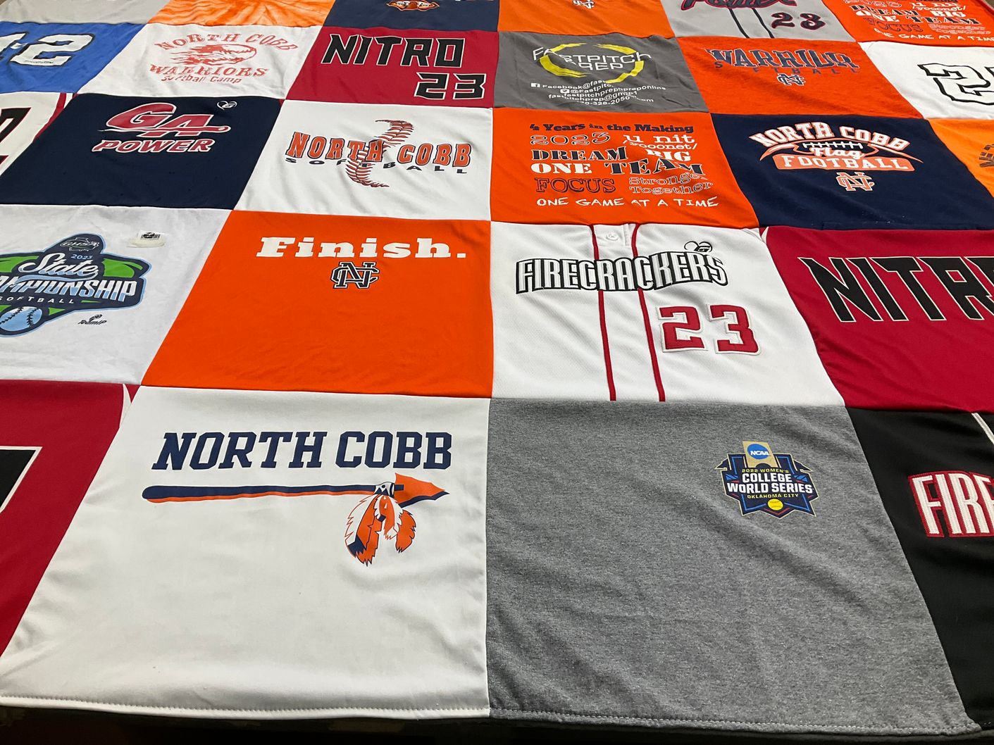 T-shirt quilt featuring north cobb football, firecrackers by Jodie from GA