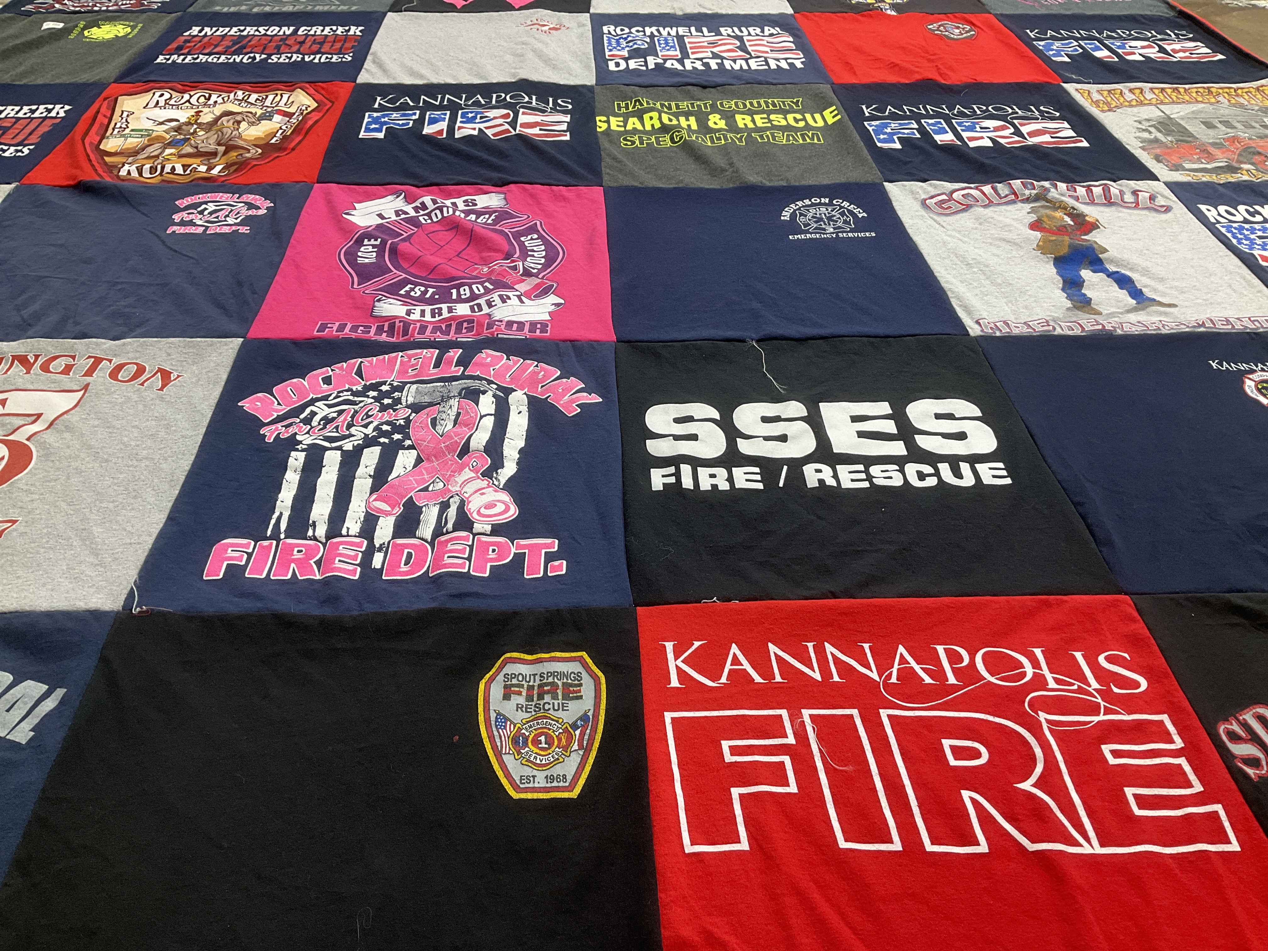 T-shirt quilt with firefighting, community service themes by Camden from NC