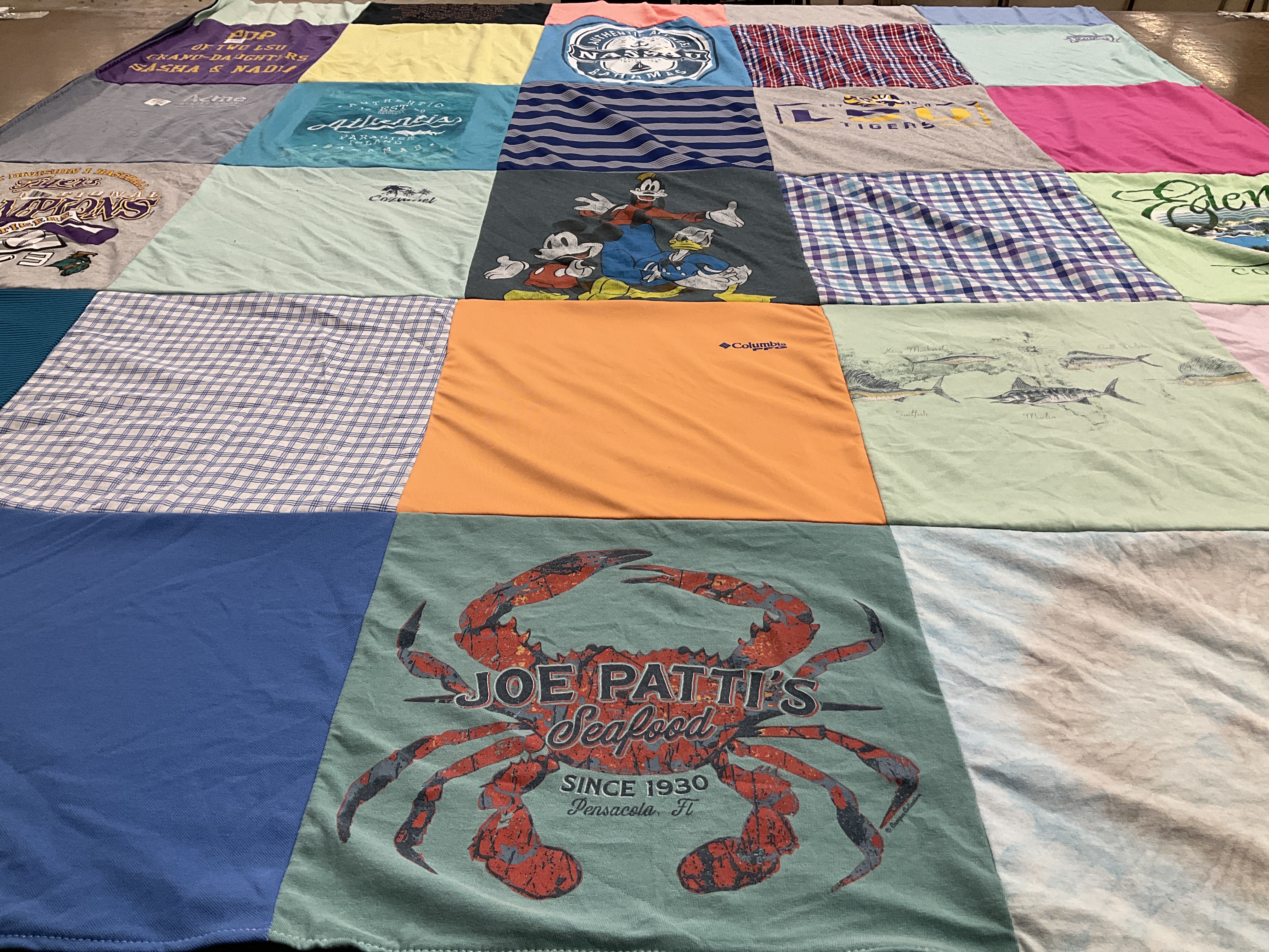 T-shirt quilt with food, sports themes by Vicki from LA