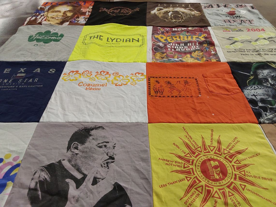 T-shirt quilt with travel, music themes by Felicia from CO