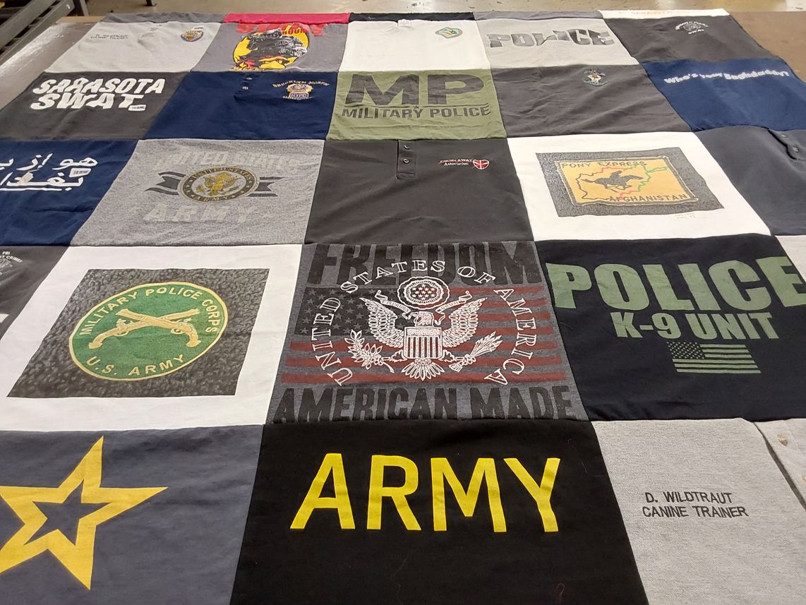 T-shirt quilt with military service, law enforcement themes by Laurie from FL