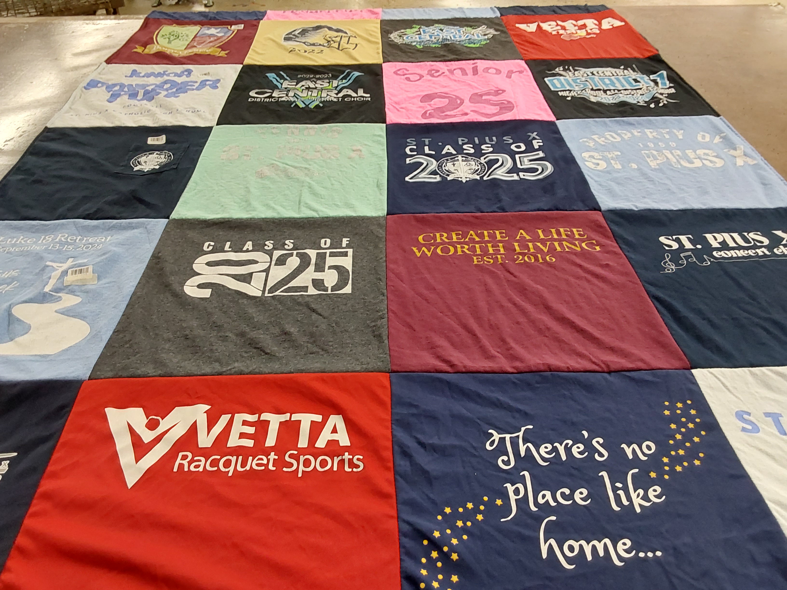 T-shirt quilt from st. pius x high school by April from MO