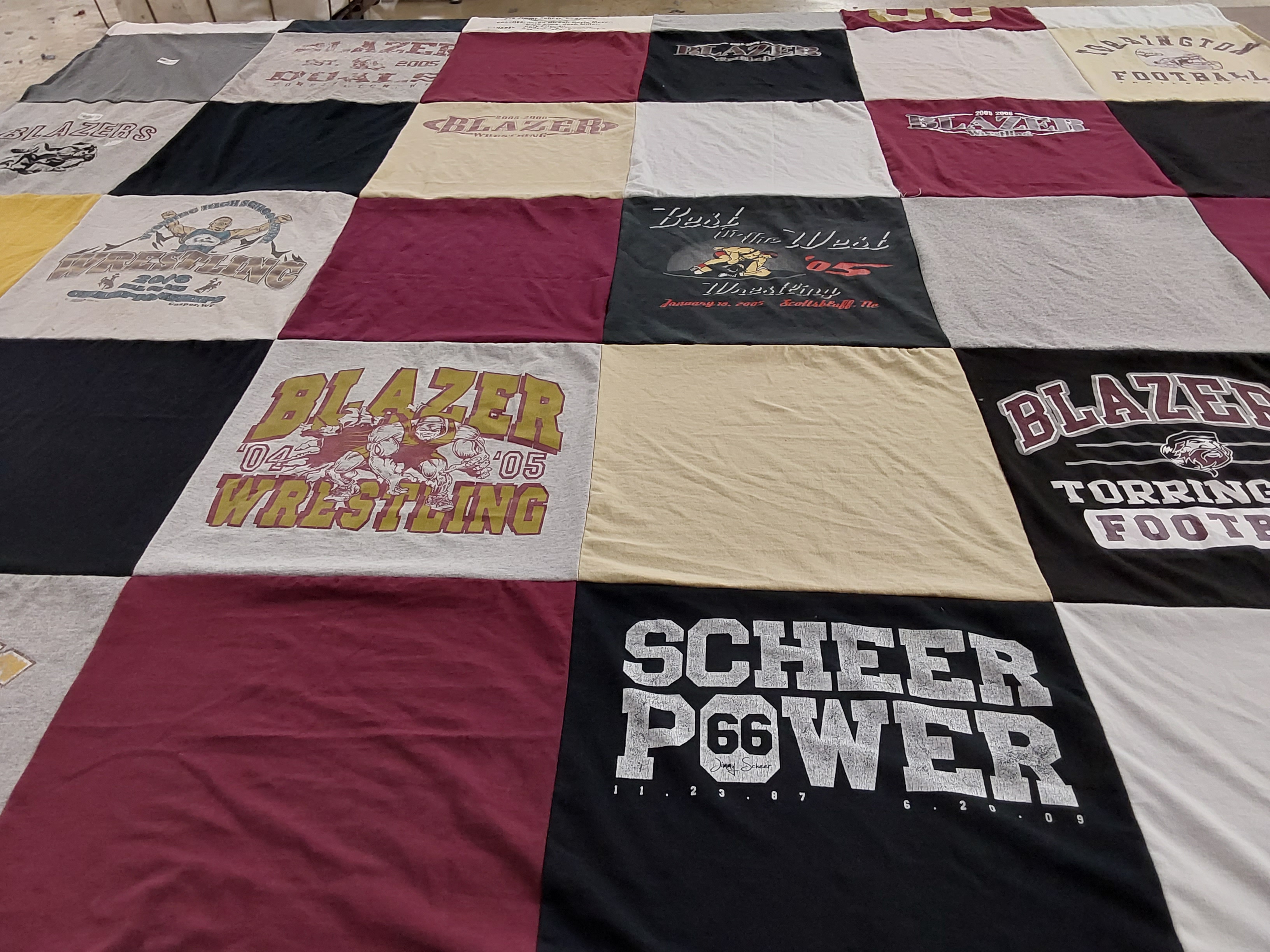 T-shirt quilt featuring torrington high school football, torrington high school wrestling by Cynthia from NE