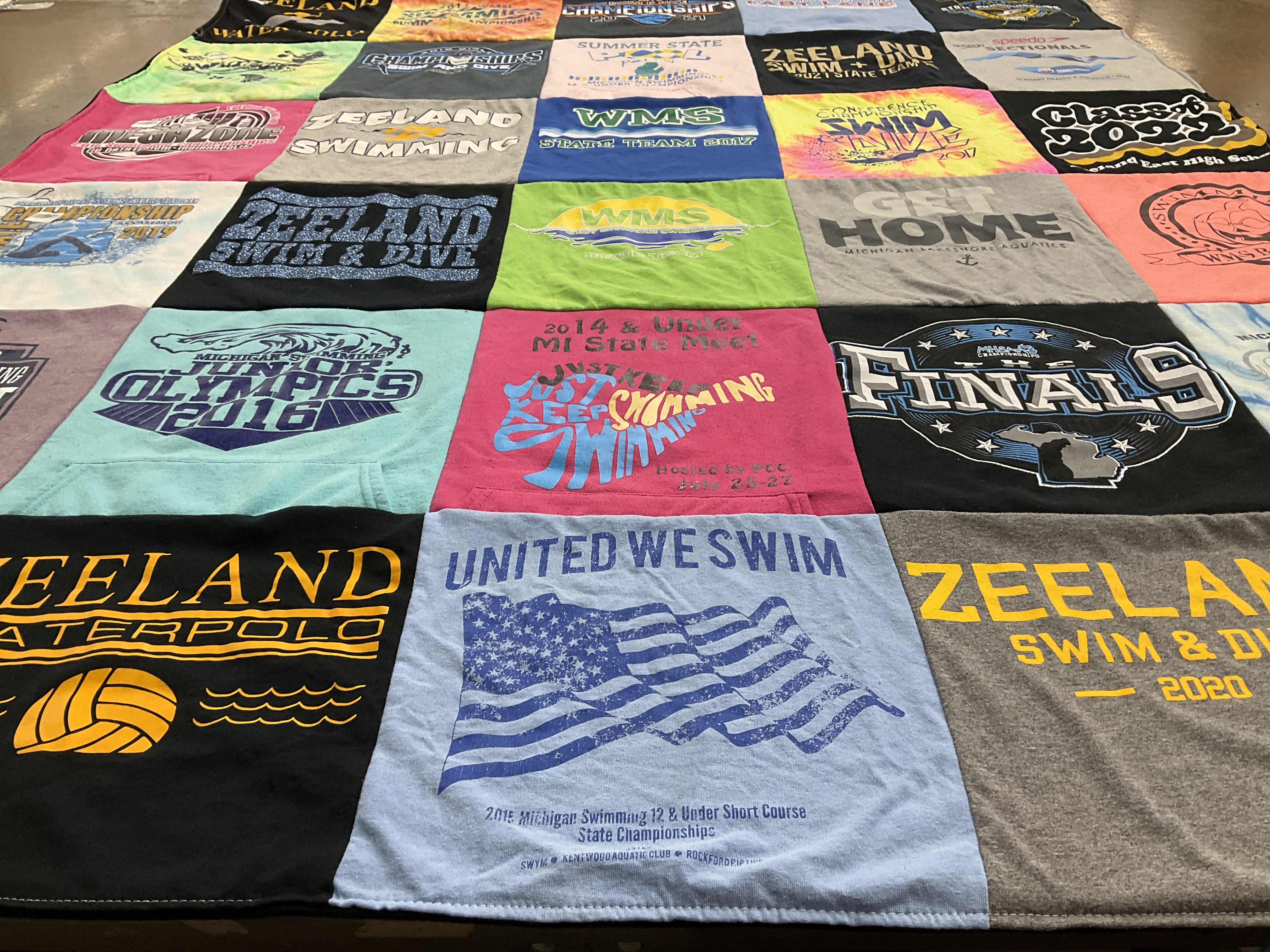 T-shirt quilt featuring zeeland swim team, zeeland waterpolo team by Stephanie from MI