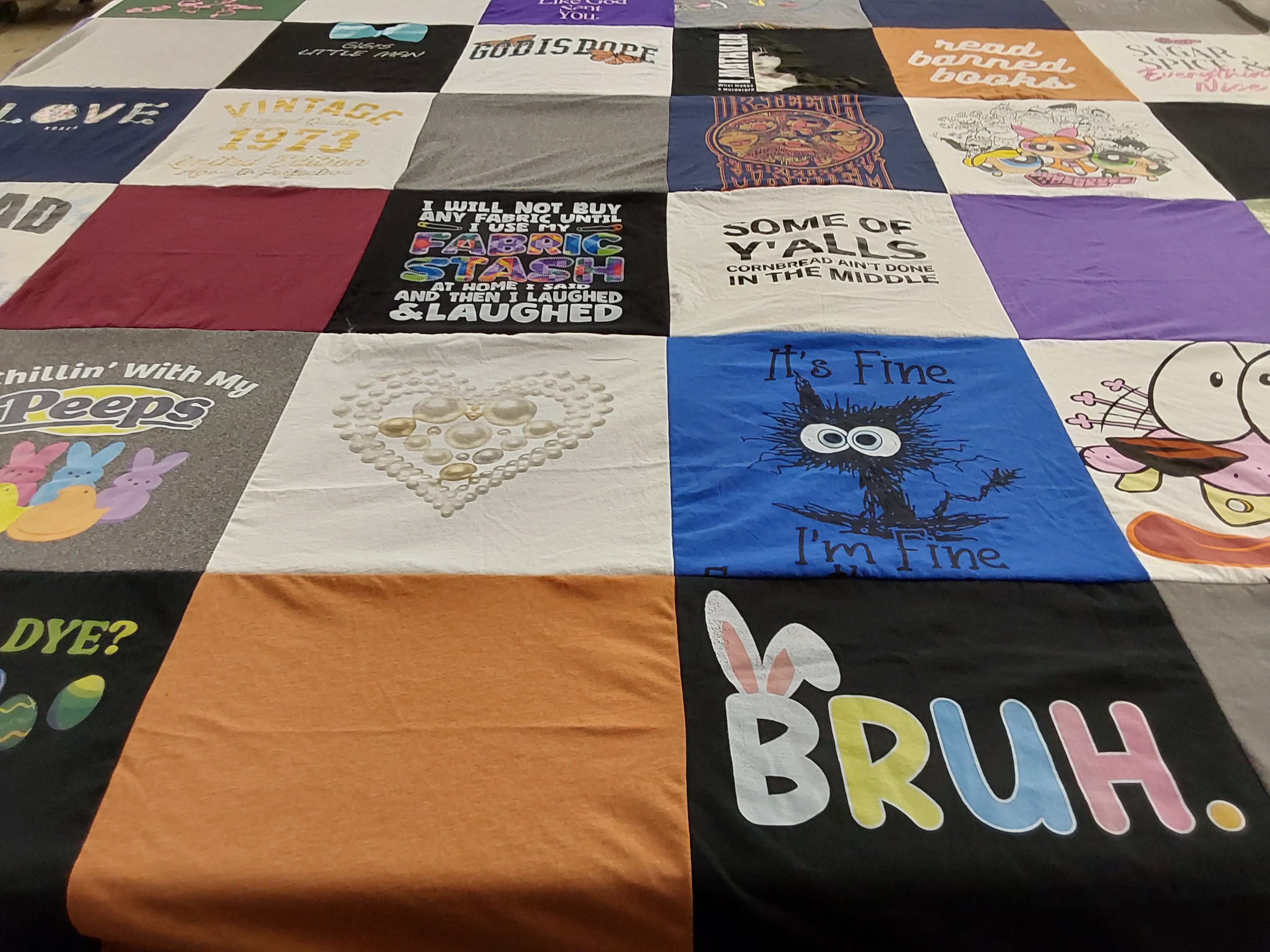 T-shirt quilt with reading, crafting themes by Angela from LA